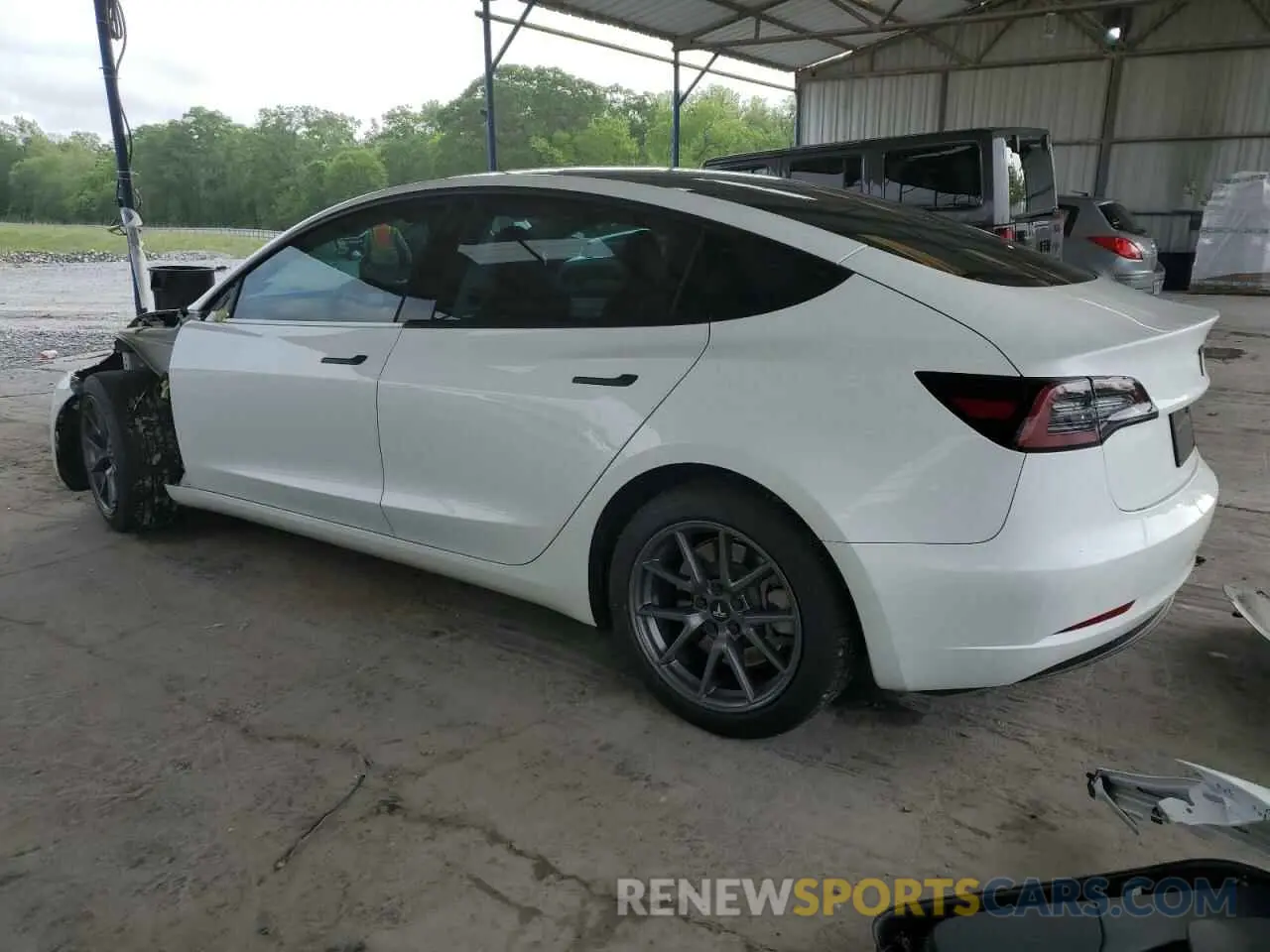2 Photograph of a damaged car 5YJ3E1EA1PF543214 TESLA MODEL 3 2023