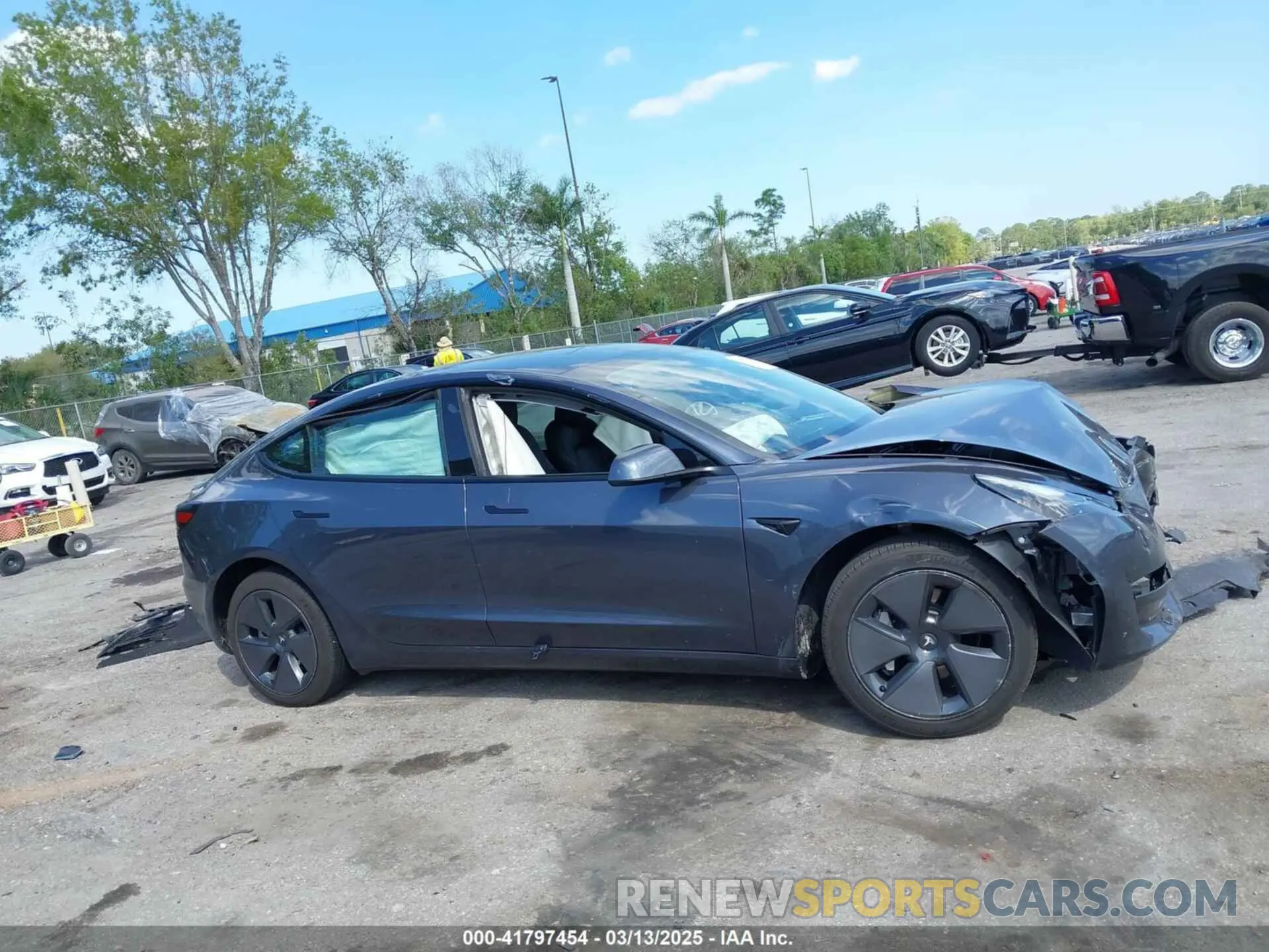 12 Photograph of a damaged car 5YJ3E1EA1PF601418 TESLA MODEL 3 2023
