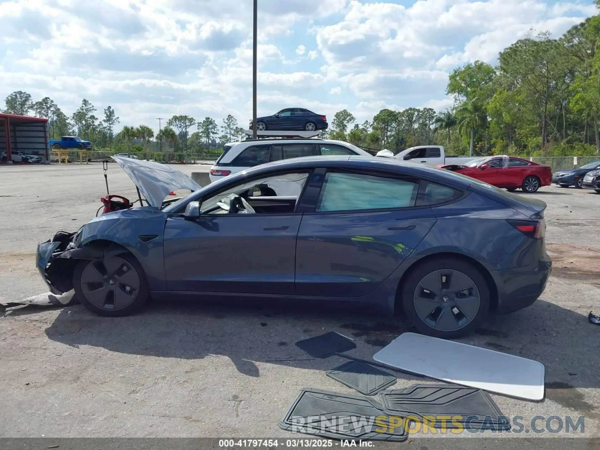 13 Photograph of a damaged car 5YJ3E1EA1PF601418 TESLA MODEL 3 2023