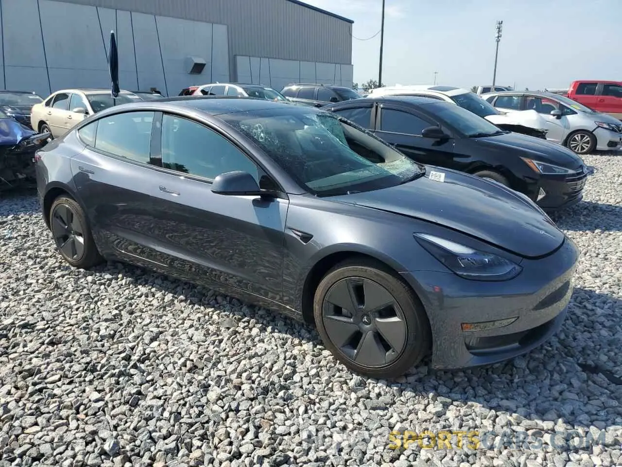 4 Photograph of a damaged car 5YJ3E1EA1PF647301 TESLA MODEL 3 2023