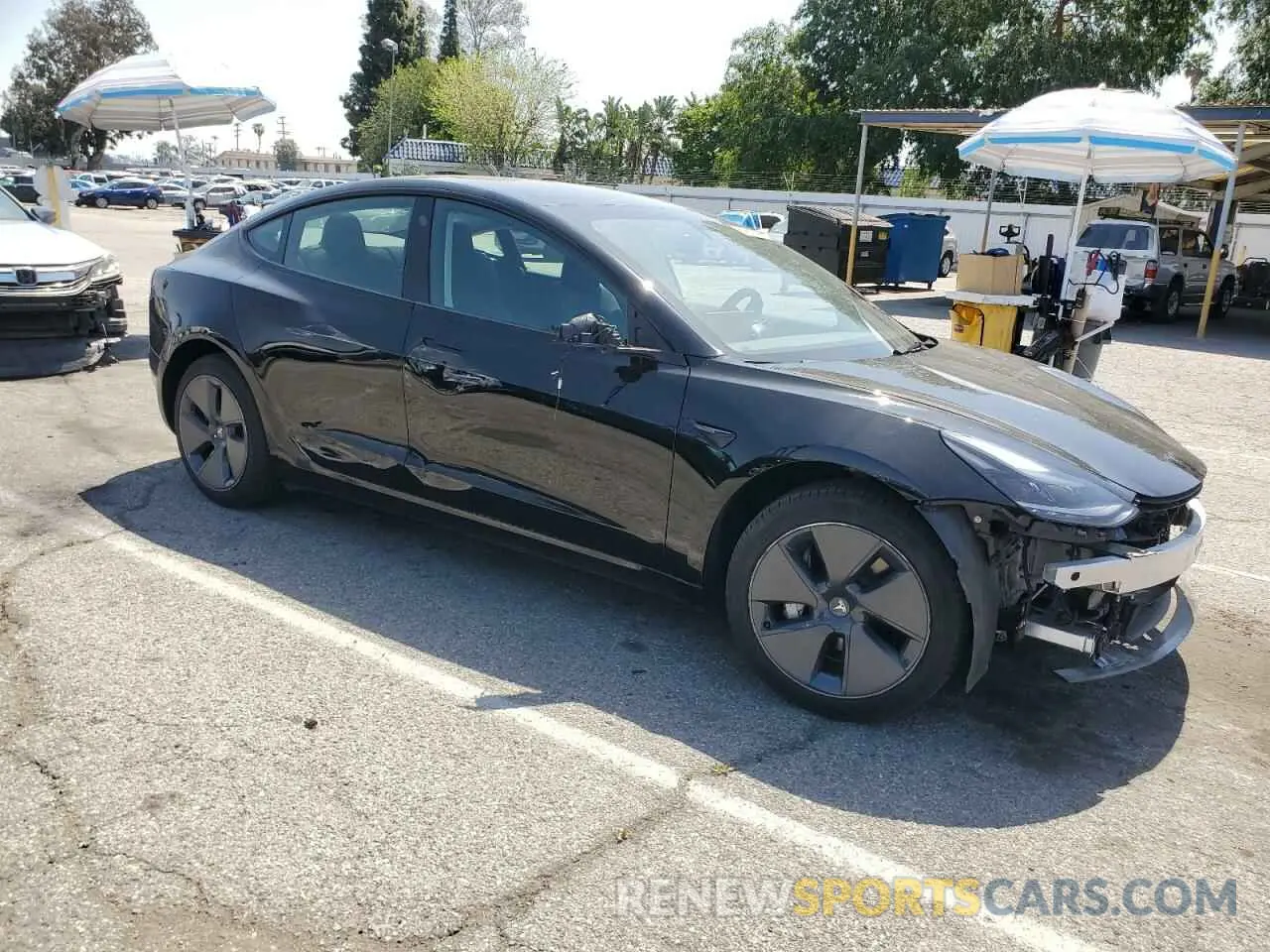 4 Фотография поврежденного автомобиля 5YJ3E1EA1PF665572 TESLA MODEL 3 2023