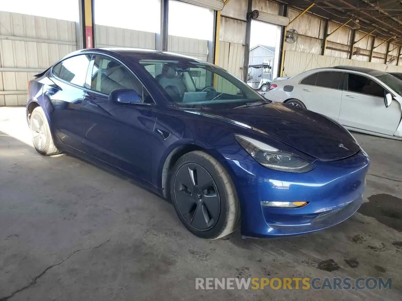 4 Photograph of a damaged car 5YJ3E1EA2PF451027 TESLA MODEL 3 2023