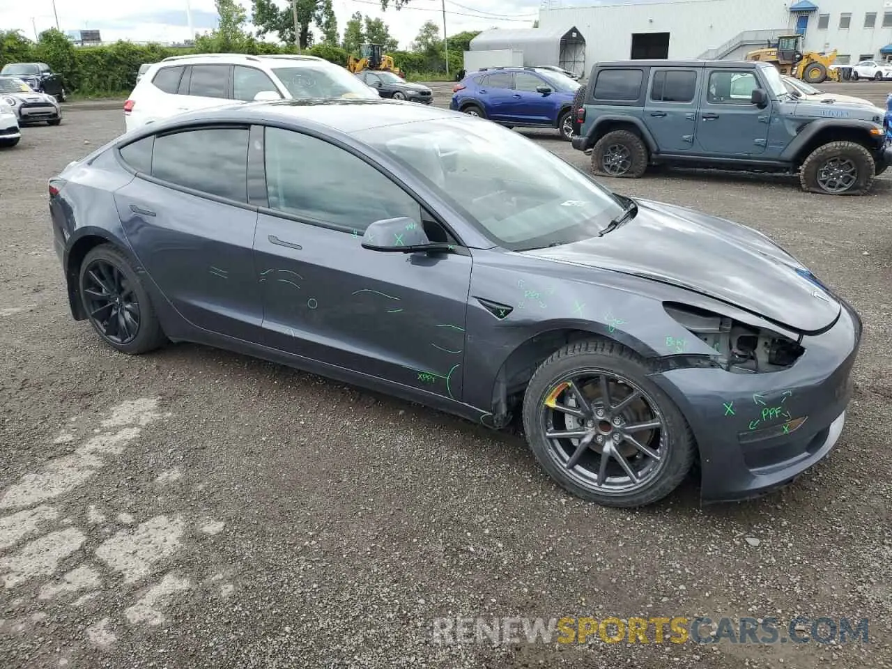 4 Photograph of a damaged car 5YJ3E1EA2PF502350 TESLA MODEL 3 2023