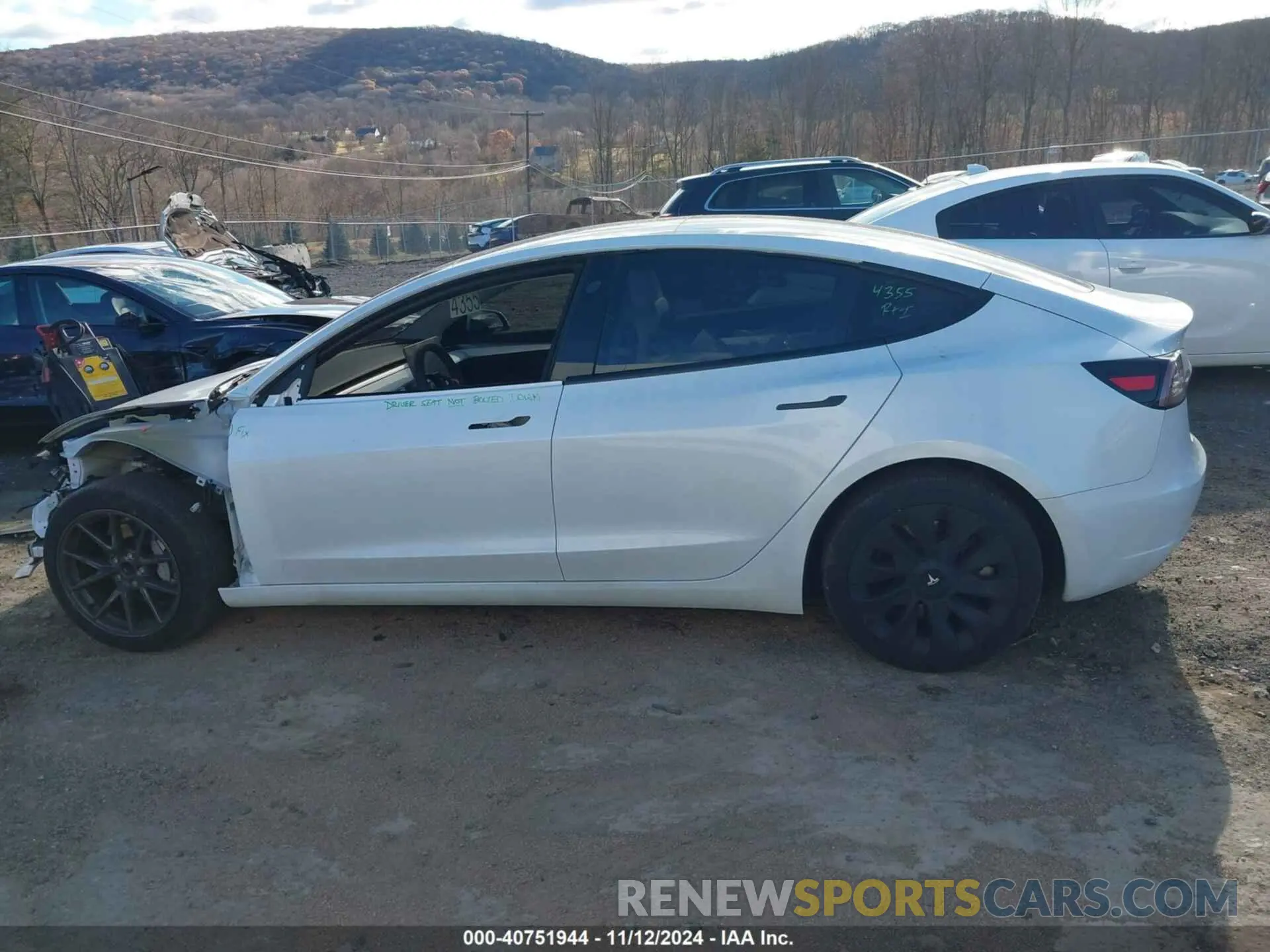 13 Photograph of a damaged car 5YJ3E1EA2PF544176 TESLA MODEL 3 2023