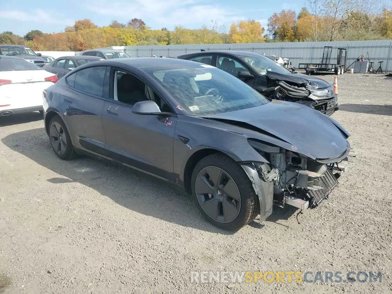 4 Photograph of a damaged car 5YJ3E1EA2PF662082 TESLA MODEL 3 2023