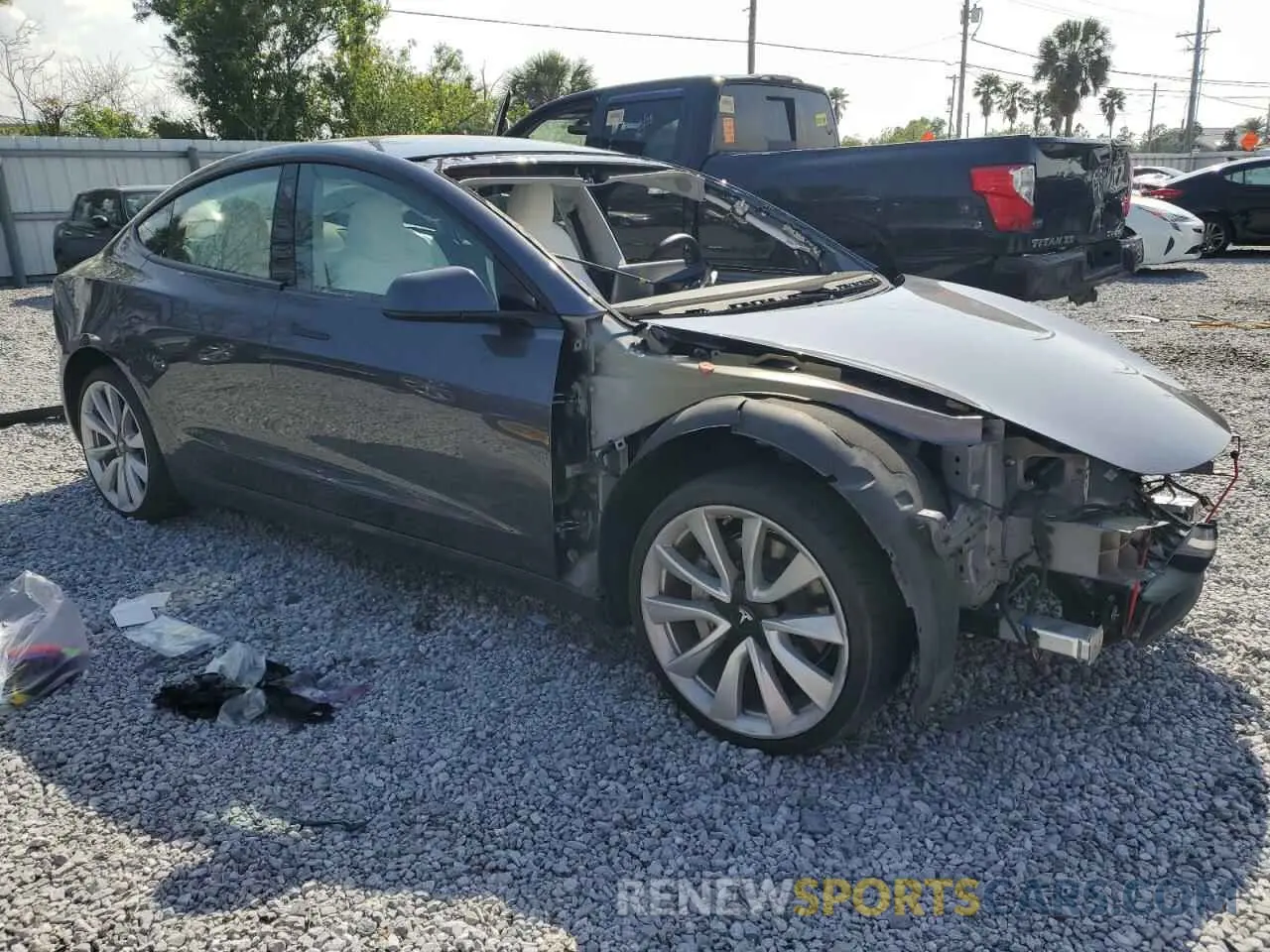4 Фотография поврежденного автомобиля 5YJ3E1EA2PF671364 TESLA MODEL 3 2023