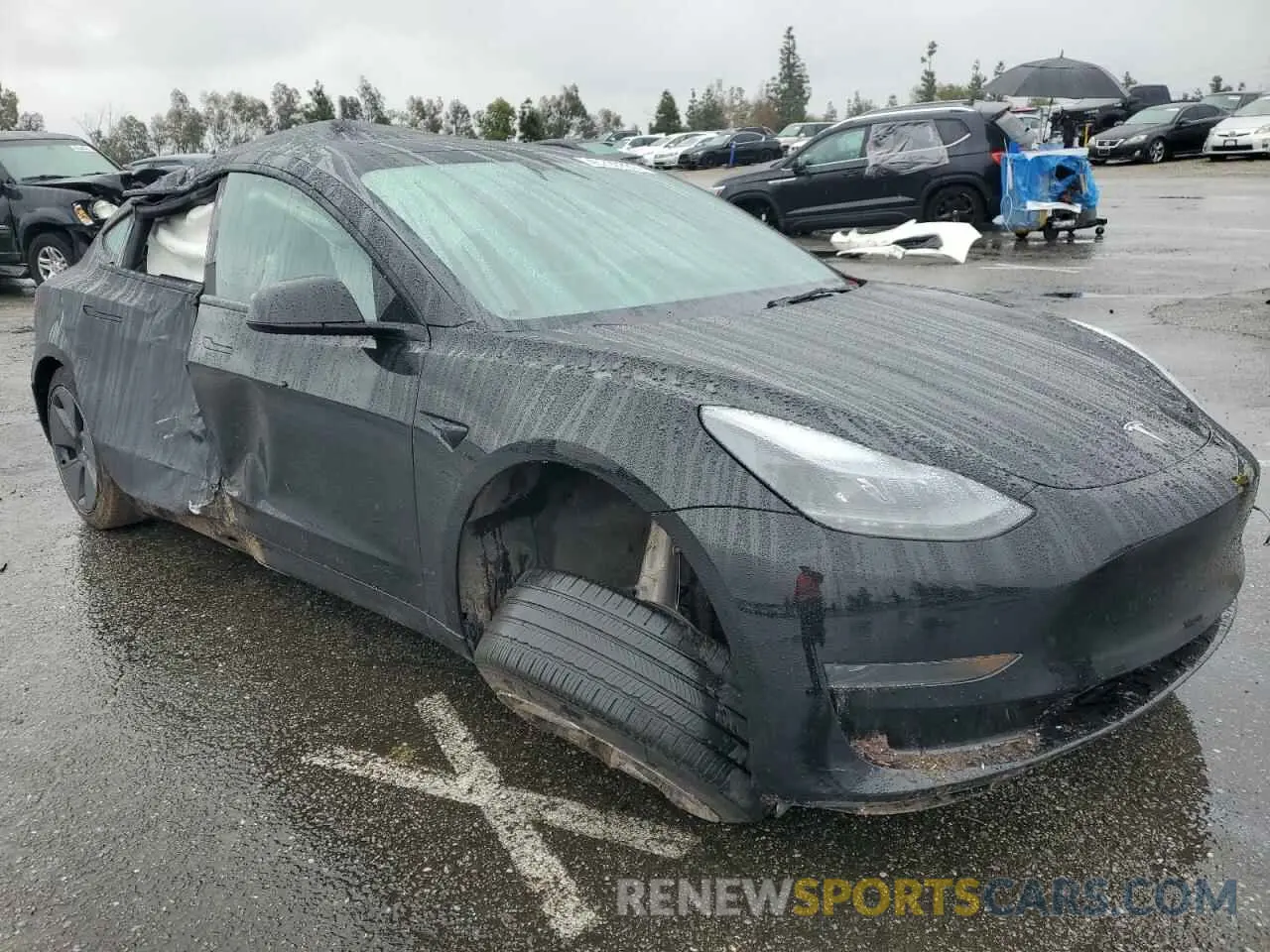 4 Photograph of a damaged car 5YJ3E1EA2PF671865 TESLA MODEL 3 2023