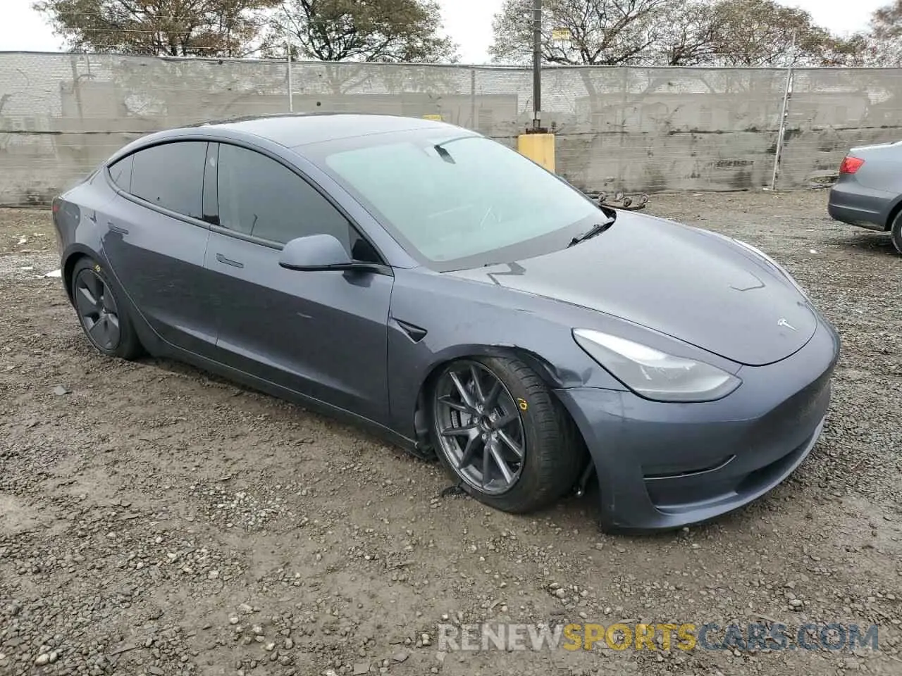 4 Photograph of a damaged car 5YJ3E1EA4PF409734 TESLA MODEL 3 2023
