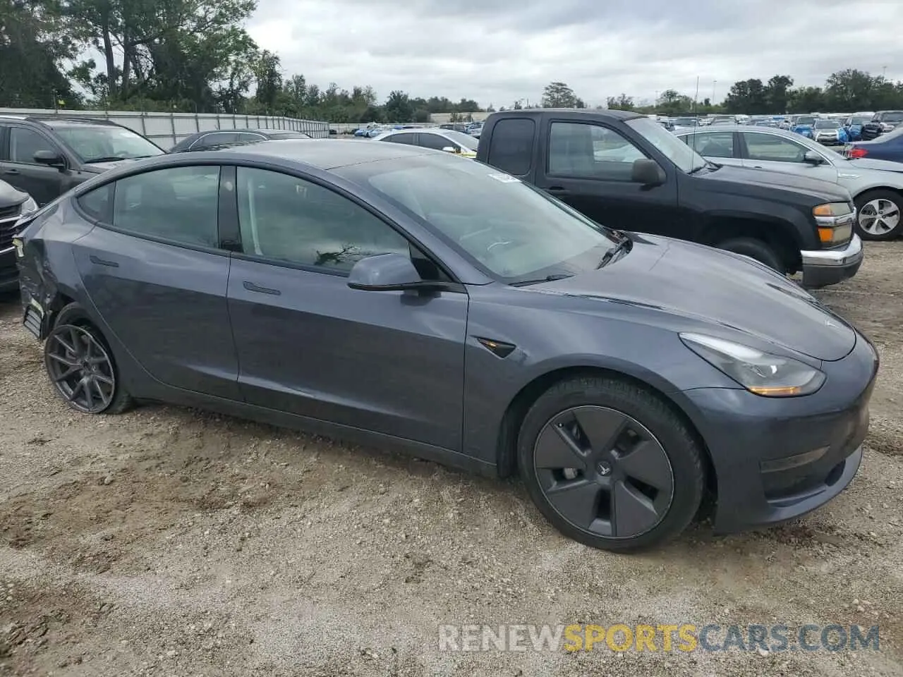 4 Photograph of a damaged car 5YJ3E1EA4PF449604 TESLA MODEL 3 2023