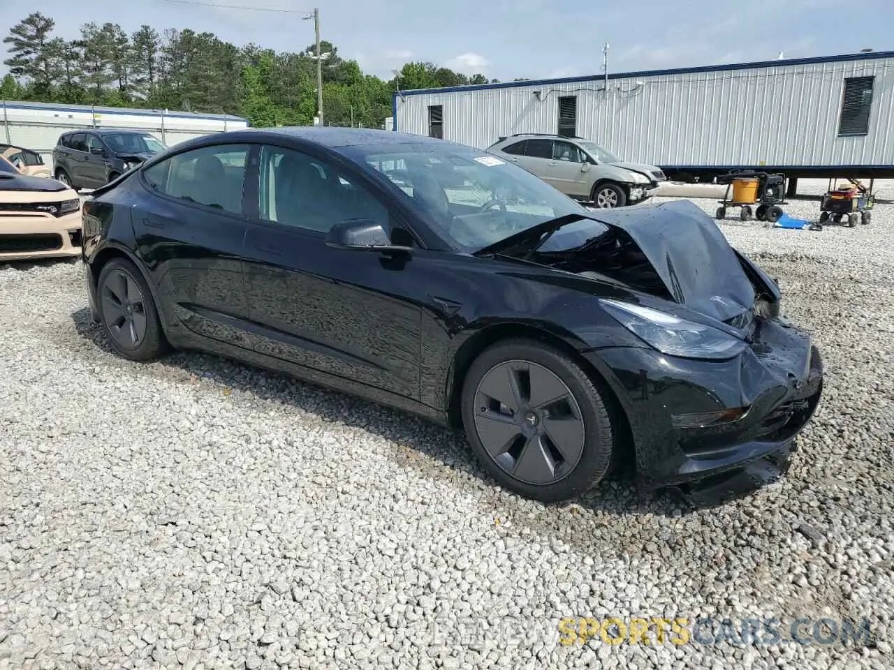 4 Photograph of a damaged car 5YJ3E1EA4PF559424 TESLA MODEL 3 2023