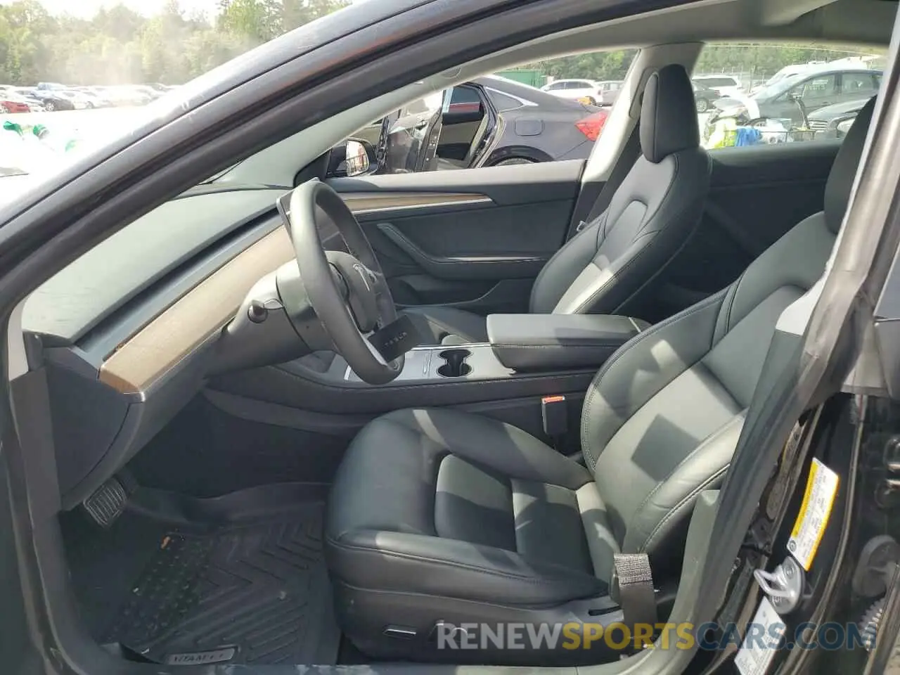 7 Photograph of a damaged car 5YJ3E1EA4PF559424 TESLA MODEL 3 2023