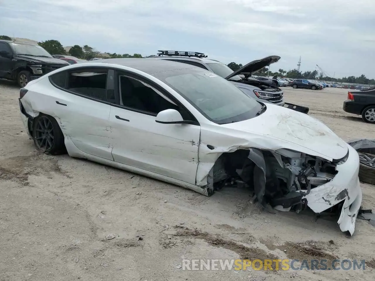 4 Photograph of a damaged car 5YJ3E1EA4PF567345 TESLA MODEL 3 2023