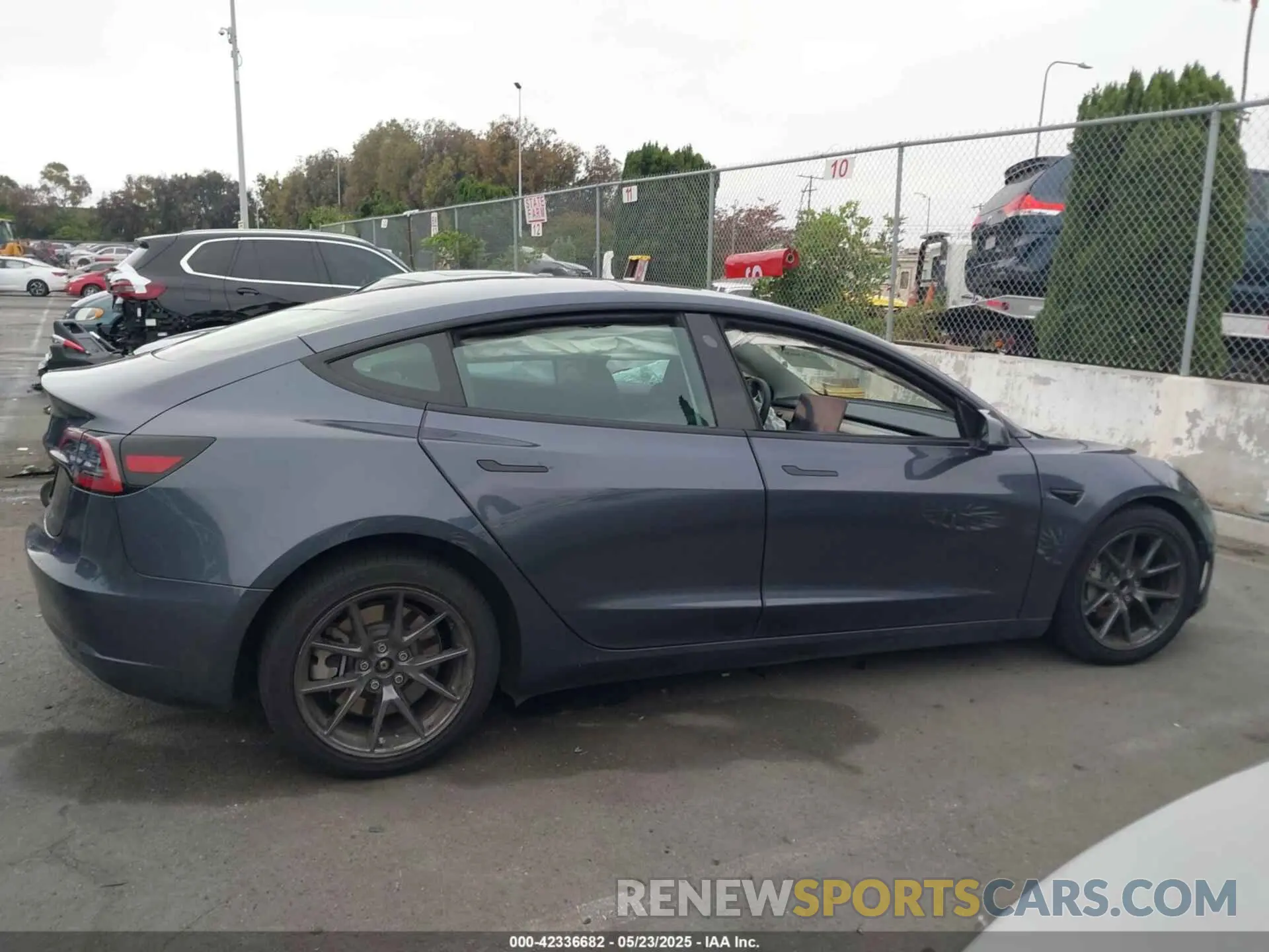 13 Photograph of a damaged car 5YJ3E1EA4PF705949 TESLA MODEL 3 2023