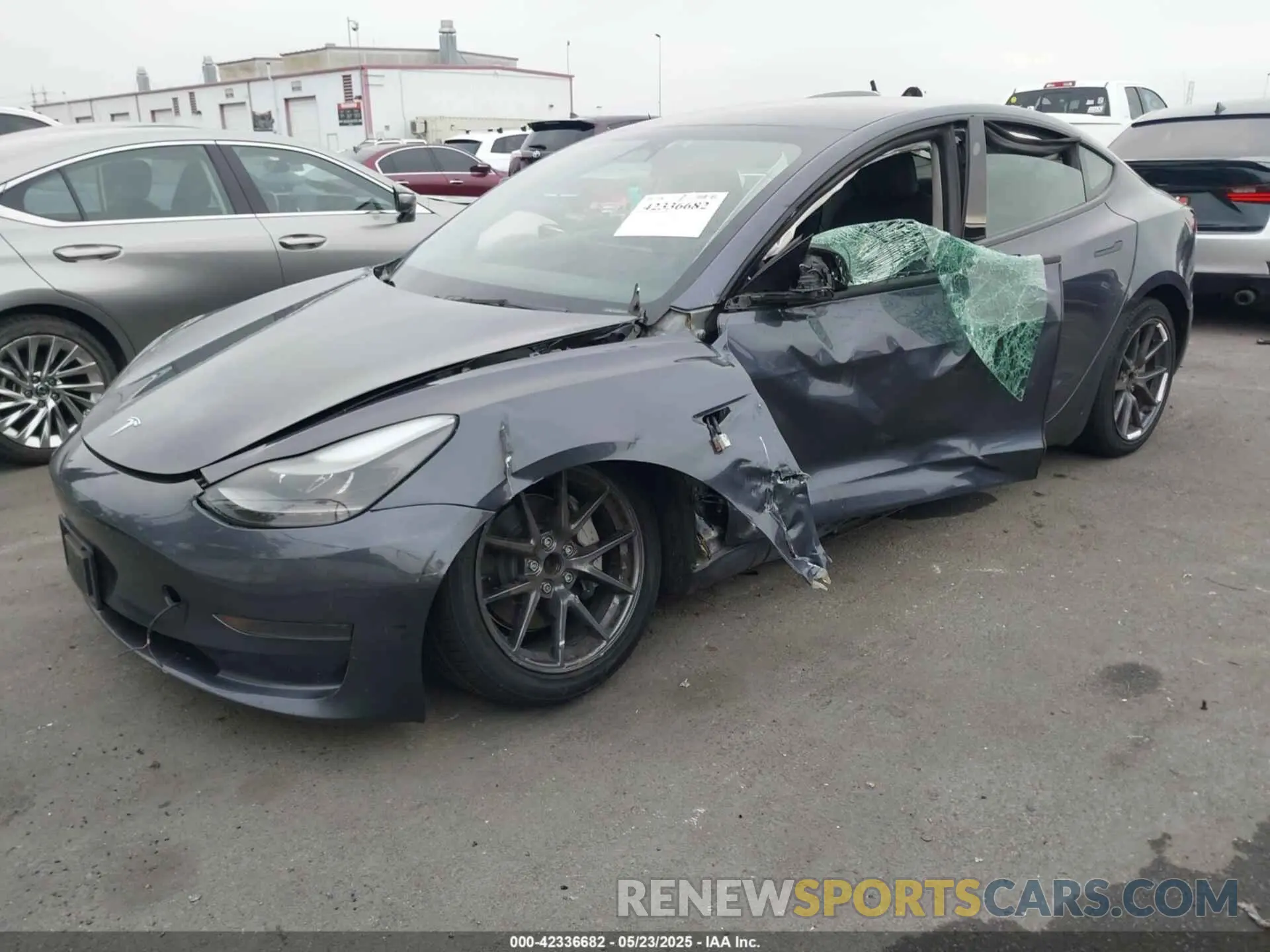 2 Photograph of a damaged car 5YJ3E1EA4PF705949 TESLA MODEL 3 2023