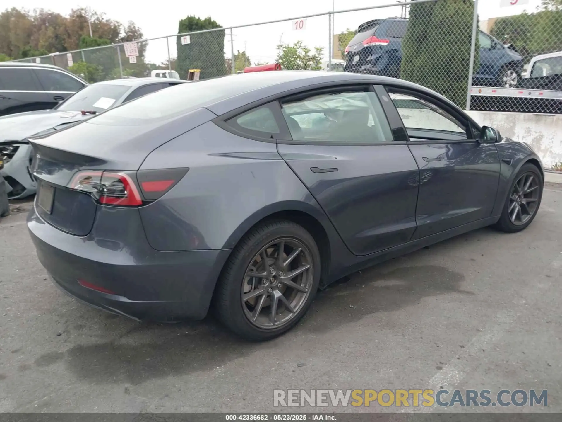4 Photograph of a damaged car 5YJ3E1EA4PF705949 TESLA MODEL 3 2023
