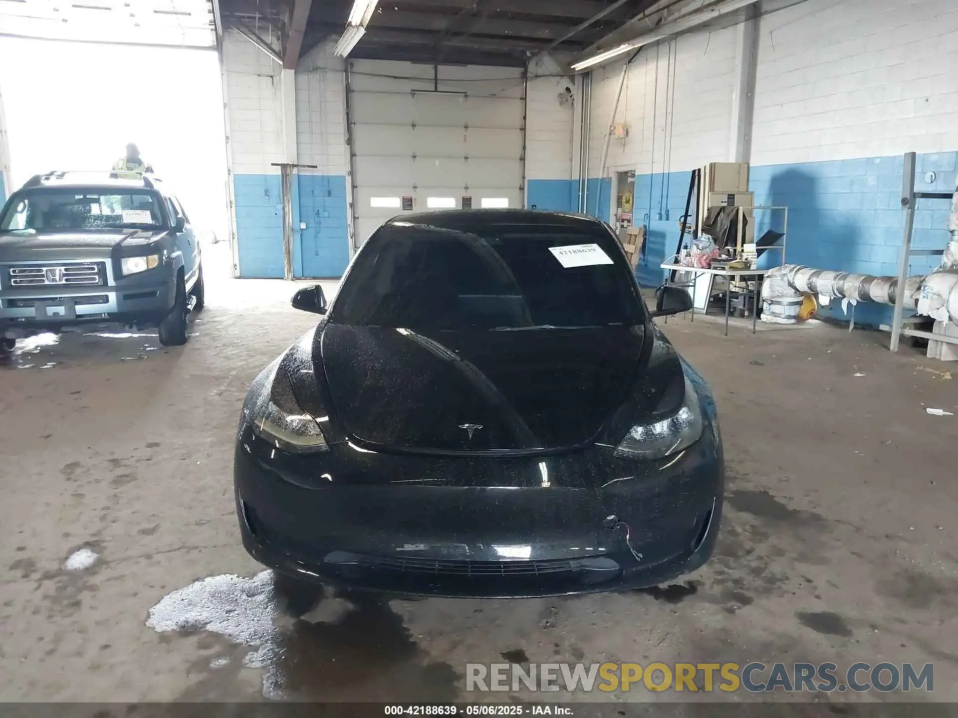12 Photograph of a damaged car 5YJ3E1EA5PF396413 TESLA MODEL 3 2023