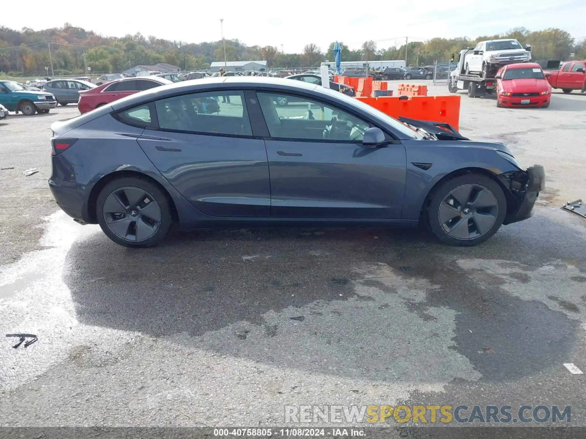 13 Photograph of a damaged car 5YJ3E1EA5PF407992 TESLA MODEL 3 2023