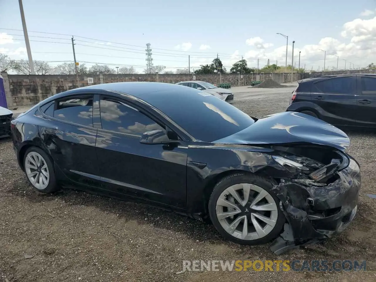 4 Photograph of a damaged car 5YJ3E1EA5PF459638 TESLA MODEL 3 2023