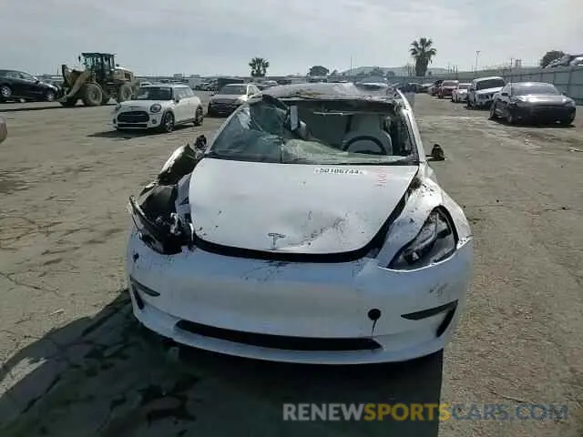 11 Фотография поврежденного автомобиля 5YJ3E1EA5PF497788 TESLA MODEL 3 2023