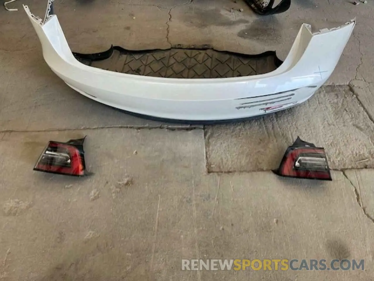 12 Photograph of a damaged car 5YJ3E1EA5PF603236 TESLA MODEL 3 2023