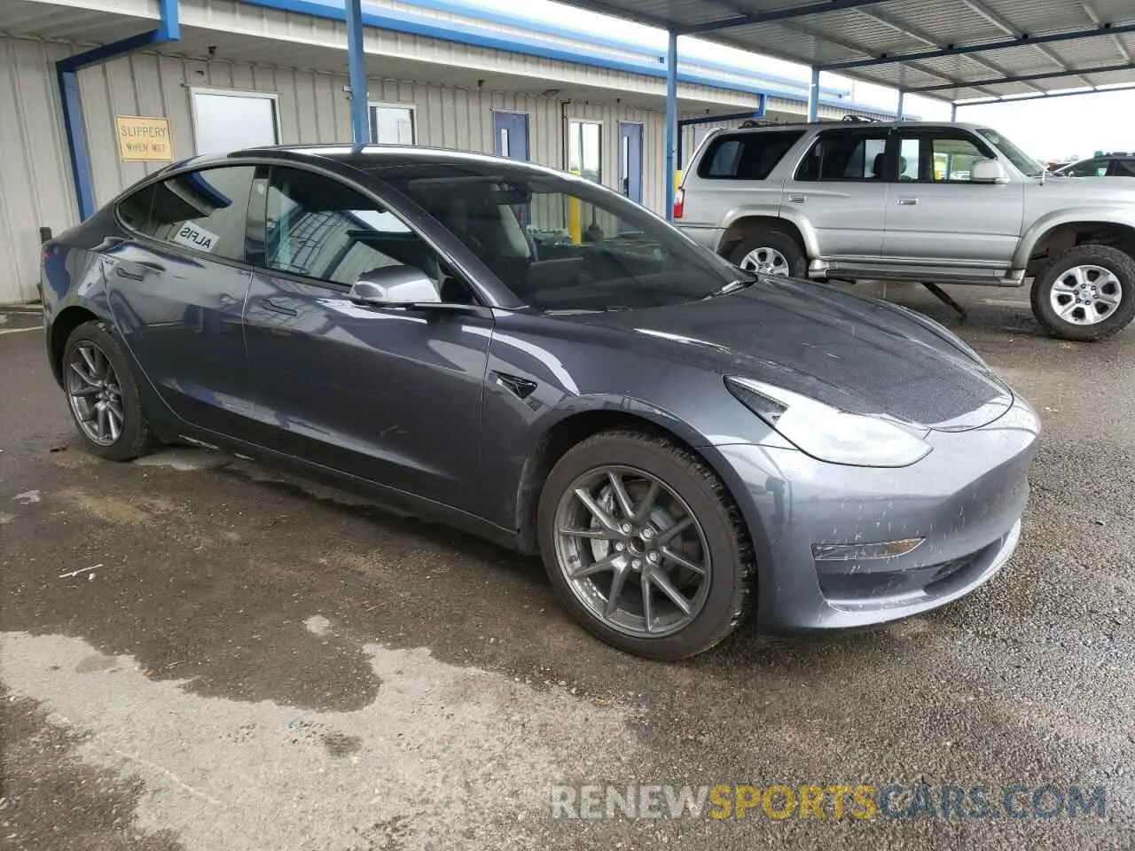 4 Photograph of a damaged car 5YJ3E1EA5PF623244 TESLA MODEL 3 2023