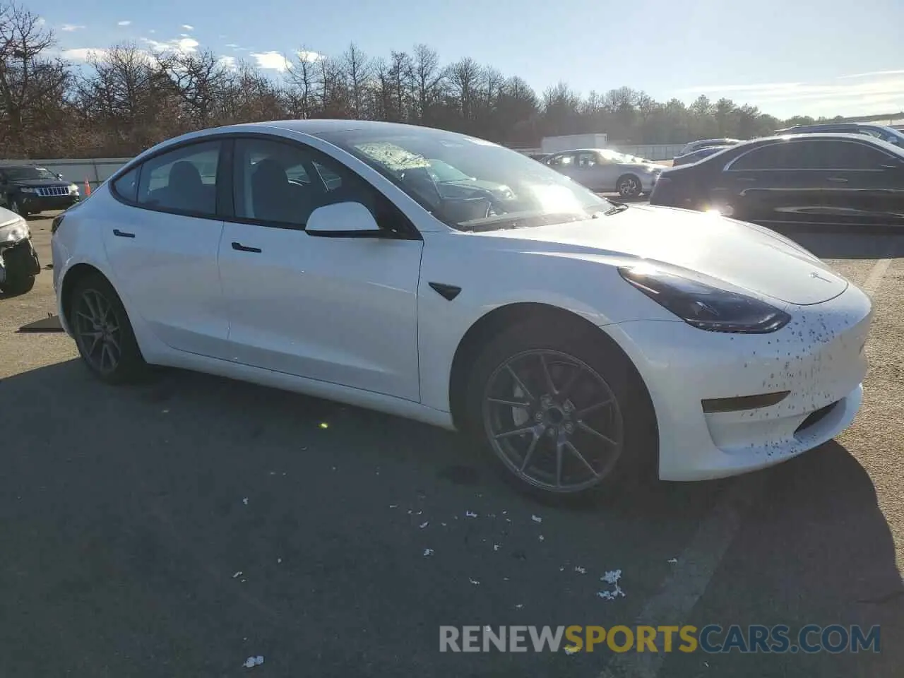 4 Photograph of a damaged car 5YJ3E1EA5PF638228 TESLA MODEL 3 2023
