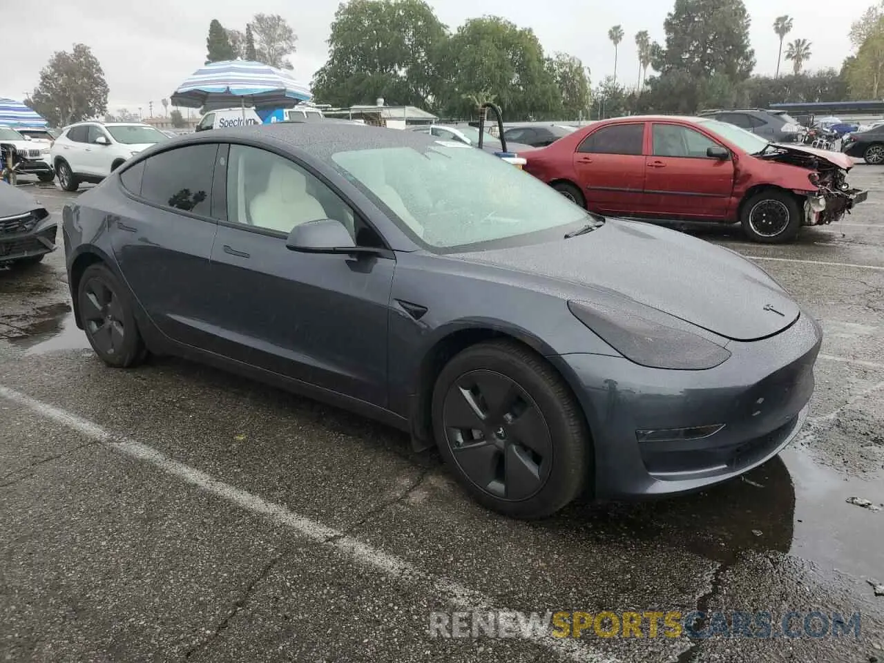 4 Photograph of a damaged car 5YJ3E1EA5PF640805 TESLA MODEL 3 2023