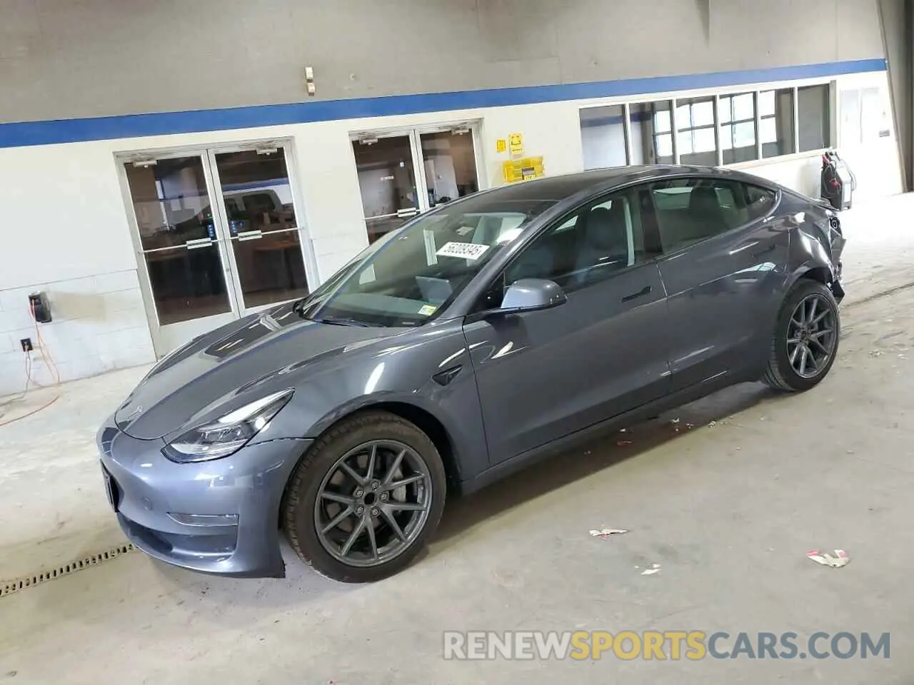 1 Photograph of a damaged car 5YJ3E1EA5PF658737 TESLA MODEL 3 2023