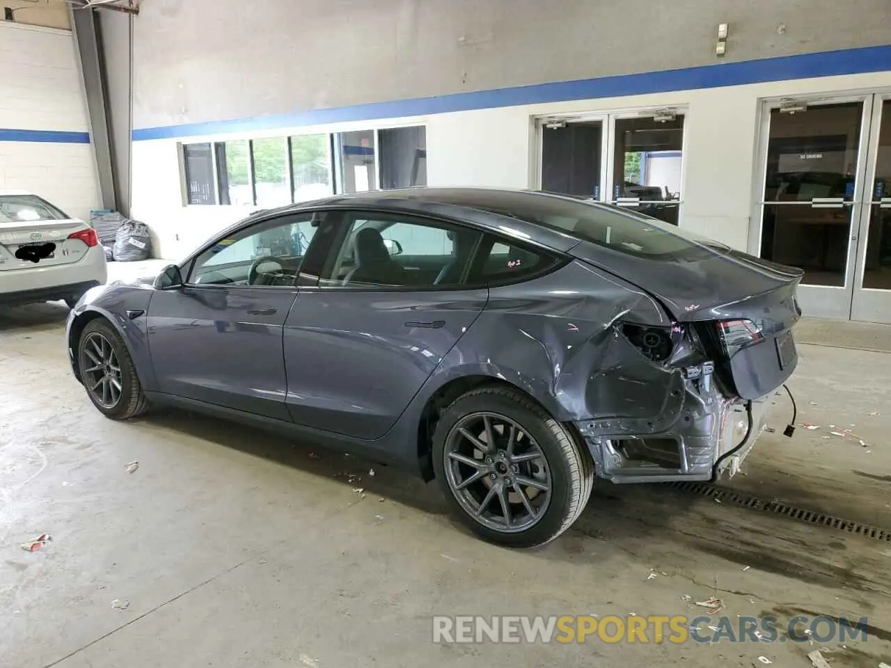 2 Photograph of a damaged car 5YJ3E1EA5PF658737 TESLA MODEL 3 2023
