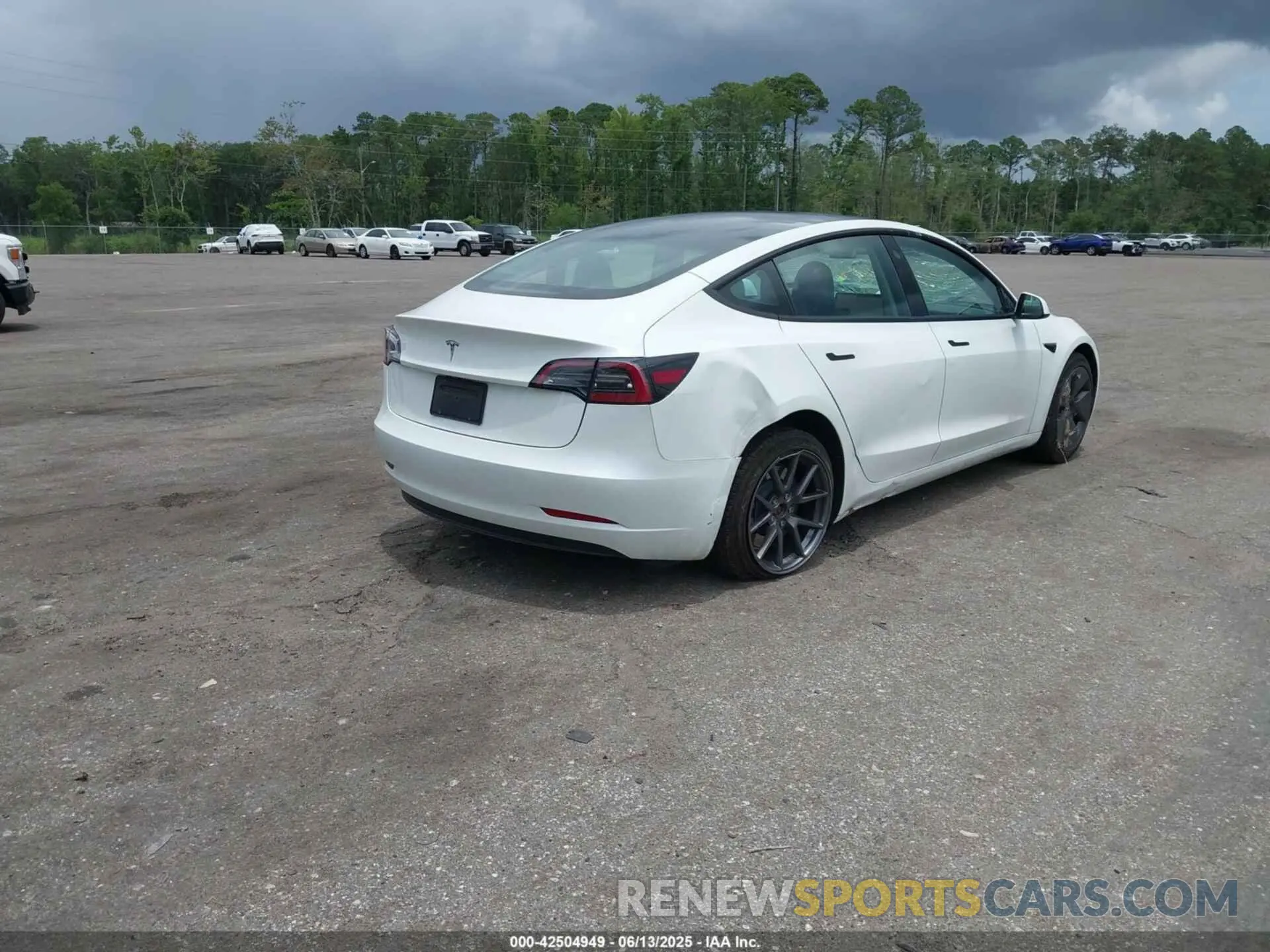 4 Photograph of a damaged car 5YJ3E1EA5PF663176 TESLA MODEL 3 2023