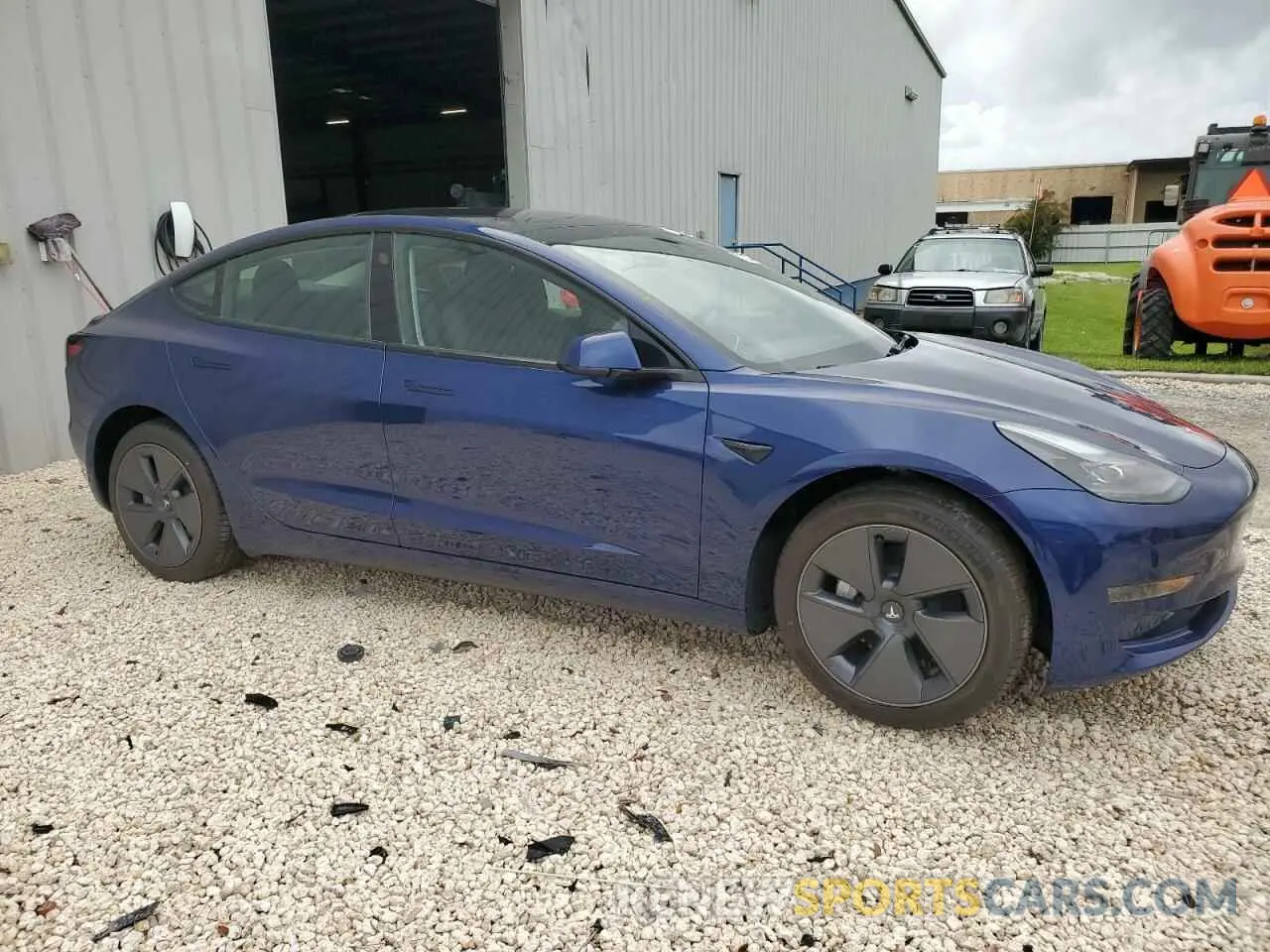 4 Photograph of a damaged car 5YJ3E1EA5PF666787 TESLA MODEL 3 2023