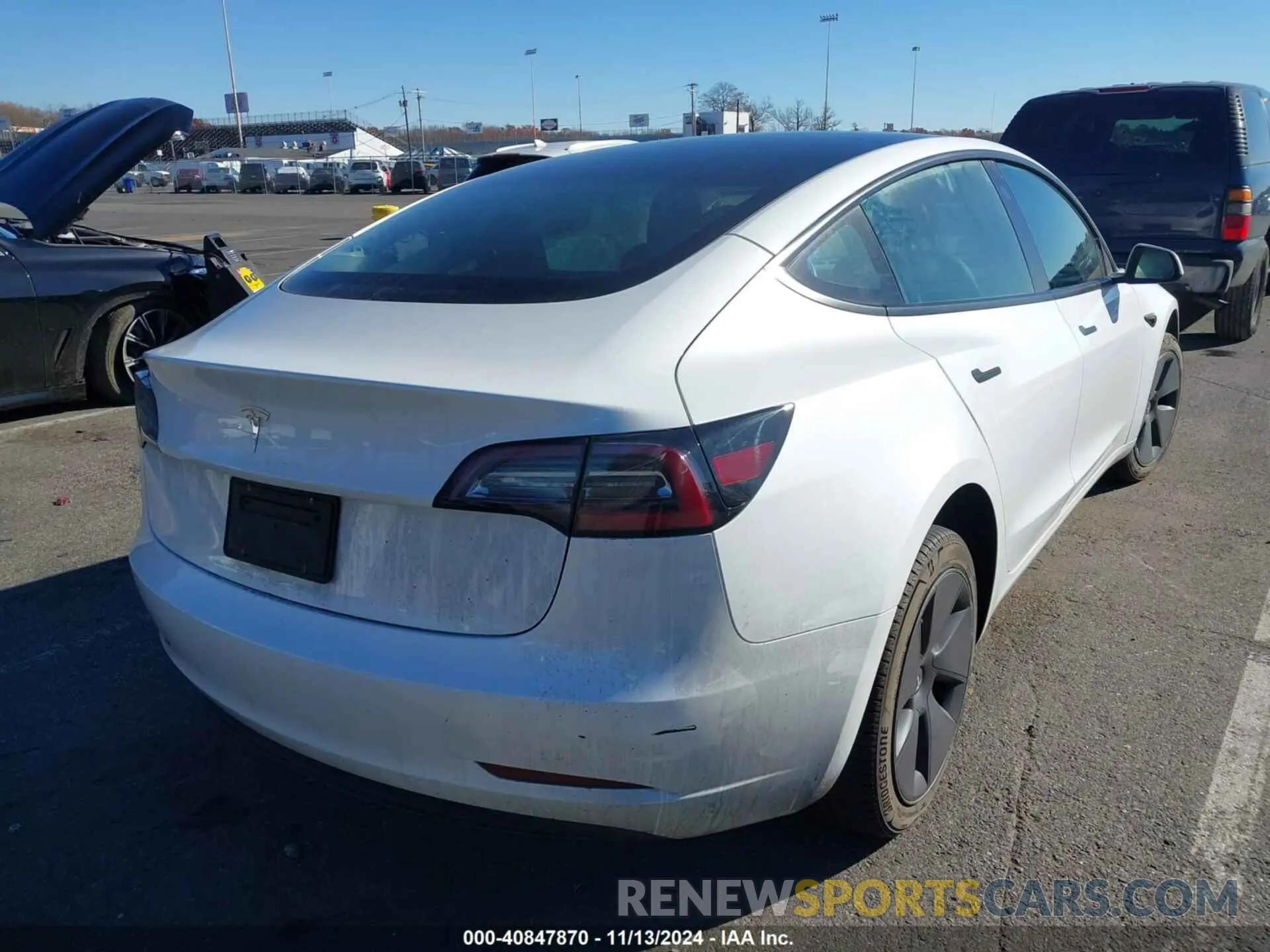 4 Photograph of a damaged car 5YJ3E1EA6PF432139 TESLA MODEL 3 2023