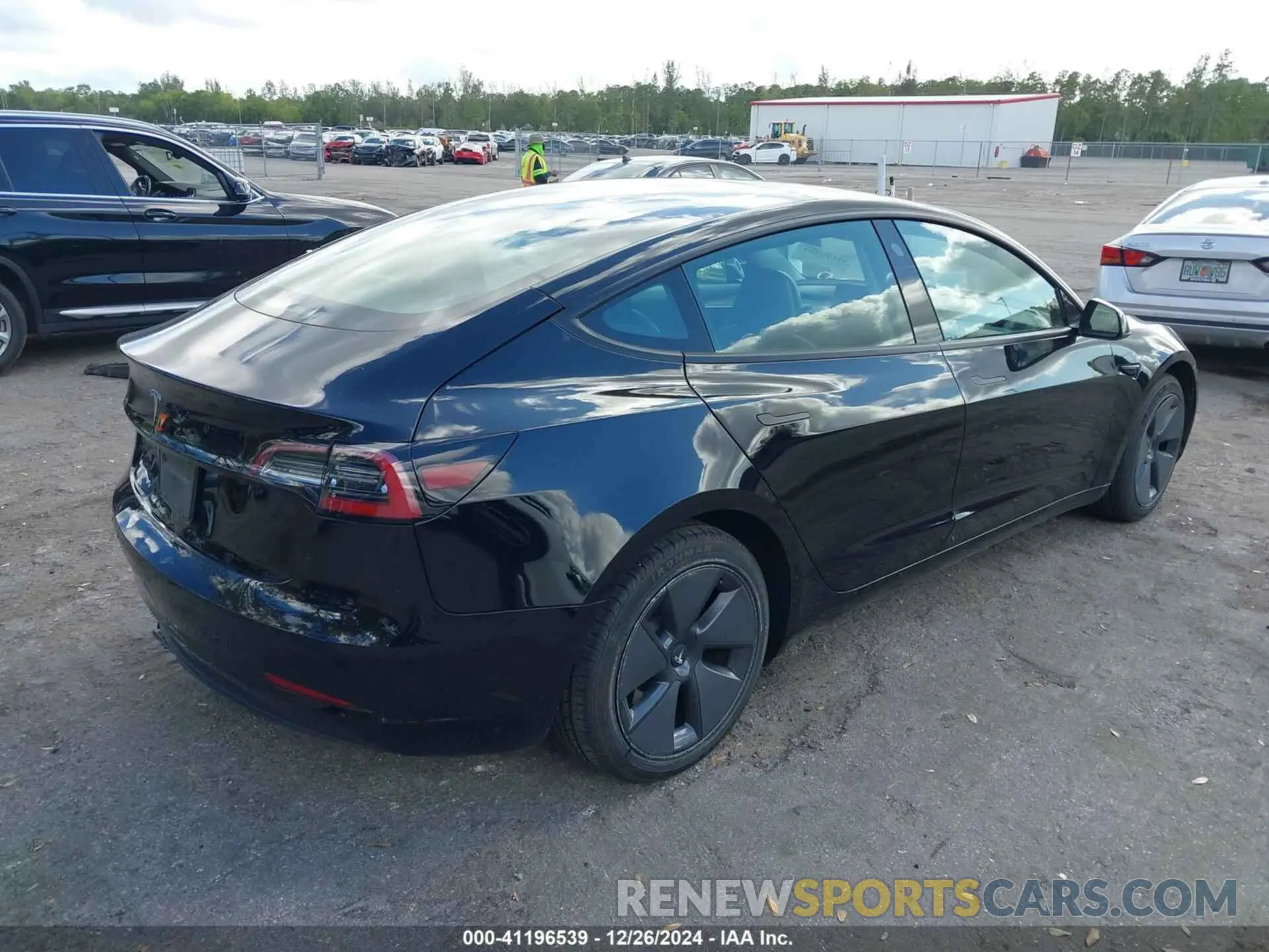 4 Photograph of a damaged car 5YJ3E1EA6PF438197 TESLA MODEL 3 2023