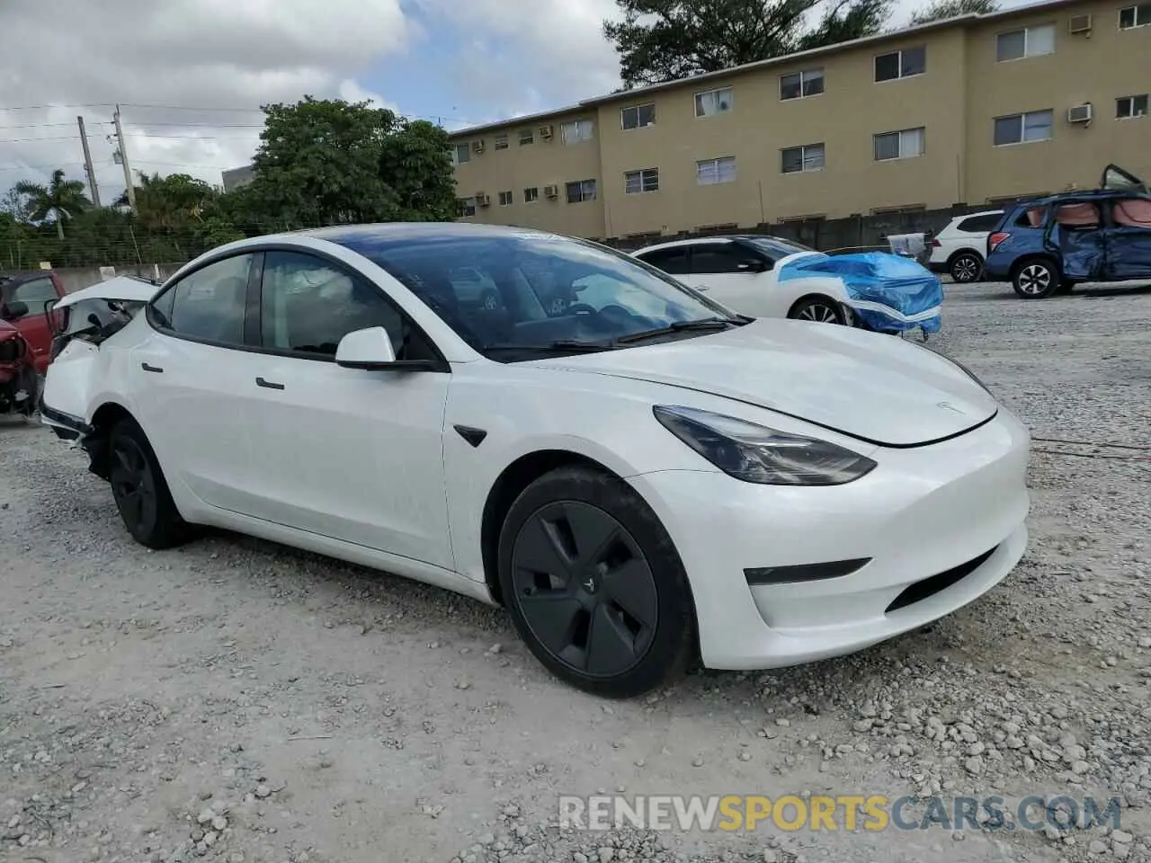 4 Фотография поврежденного автомобиля 5YJ3E1EA6PF487139 TESLA MODEL 3 2023