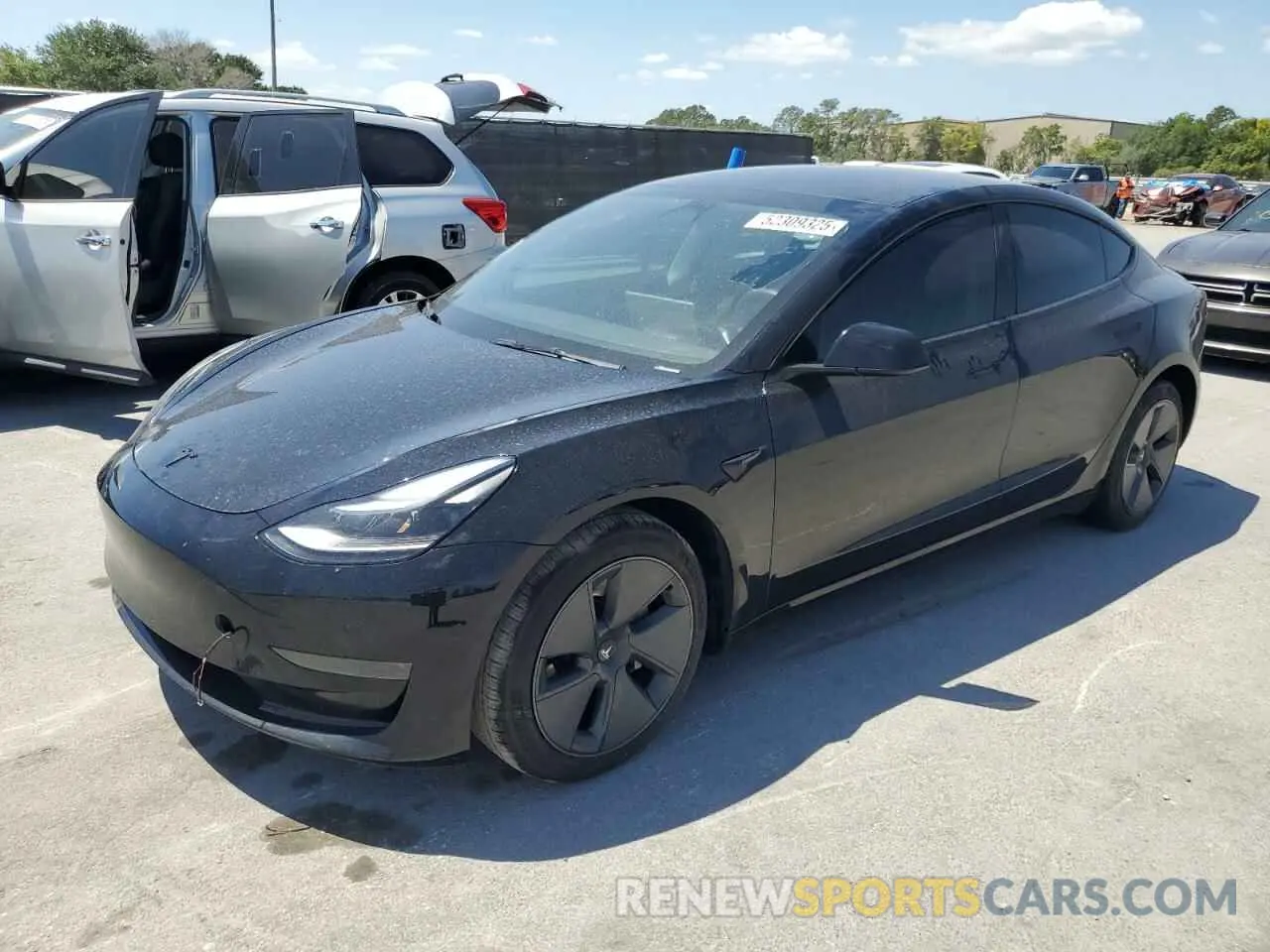 1 Photograph of a damaged car 5YJ3E1EA6PF569999 TESLA MODEL 3 2023