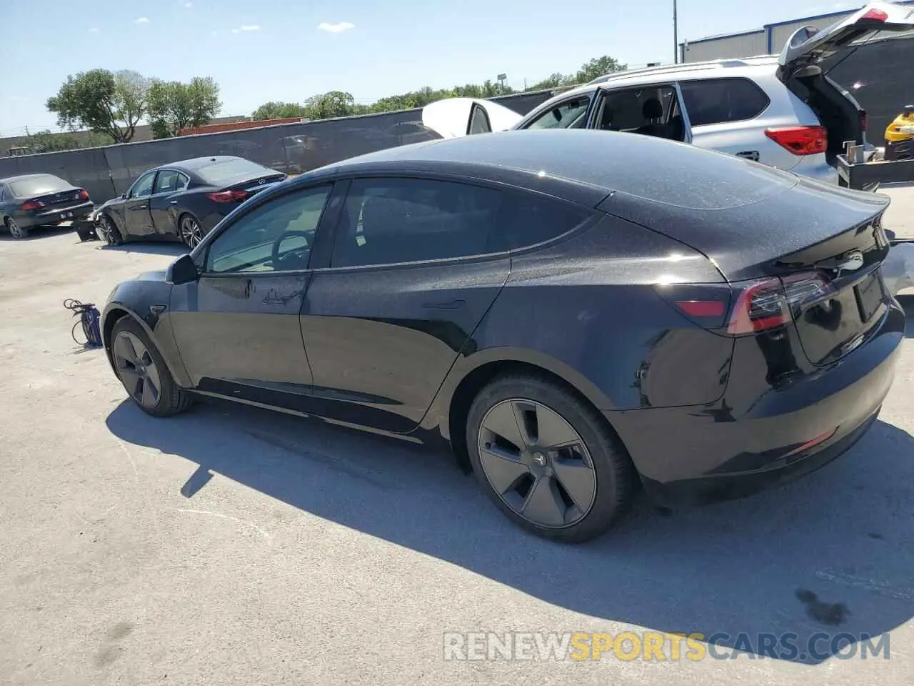 2 Photograph of a damaged car 5YJ3E1EA6PF569999 TESLA MODEL 3 2023
