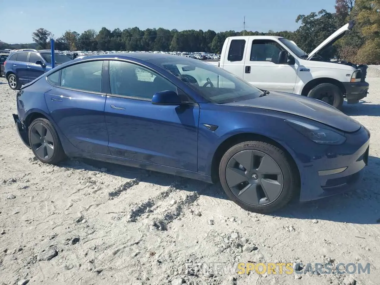 4 Photograph of a damaged car 5YJ3E1EA6PF570098 TESLA MODEL 3 2023