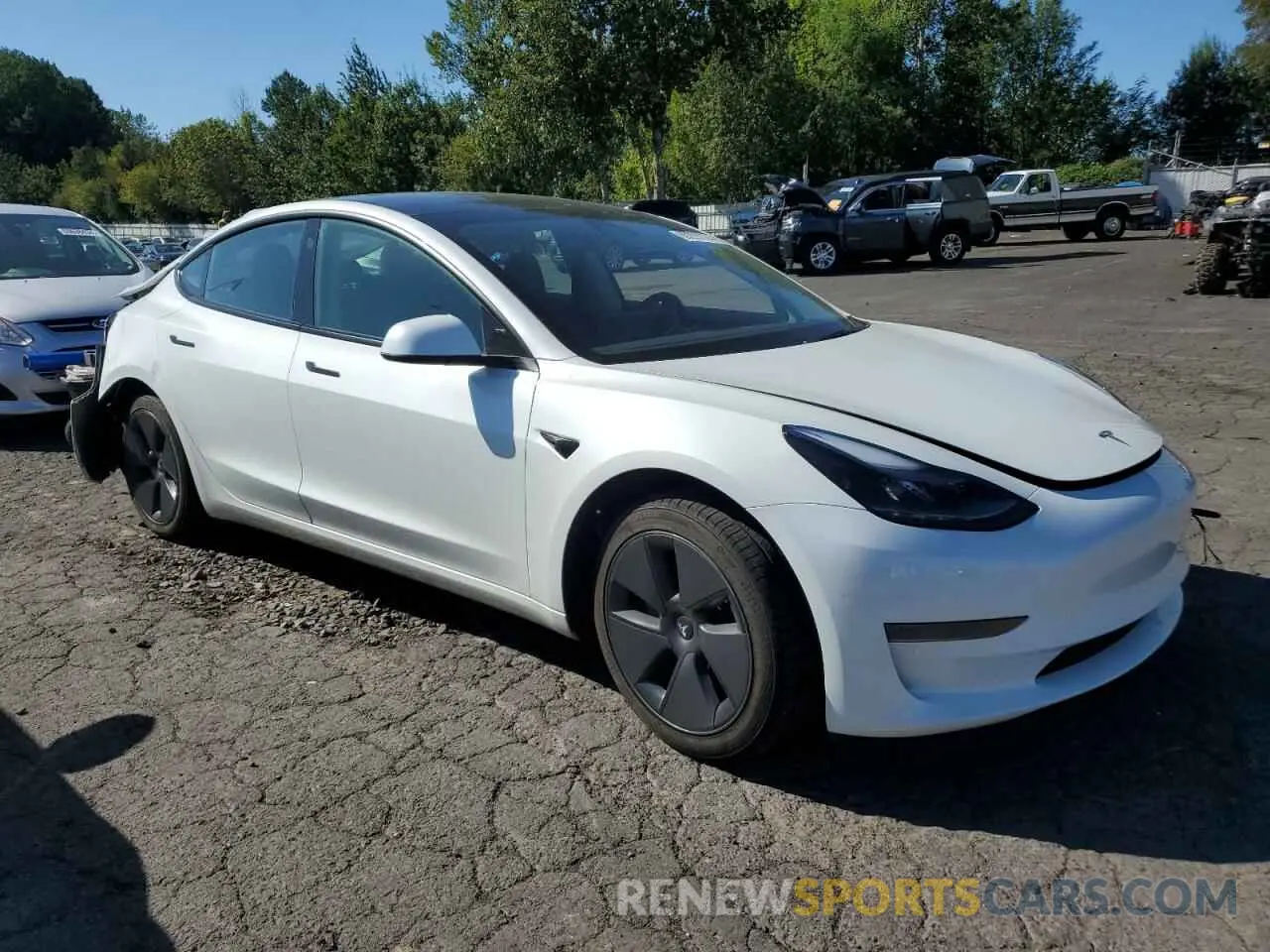 4 Photograph of a damaged car 5YJ3E1EA6PF605674 TESLA MODEL 3 2023