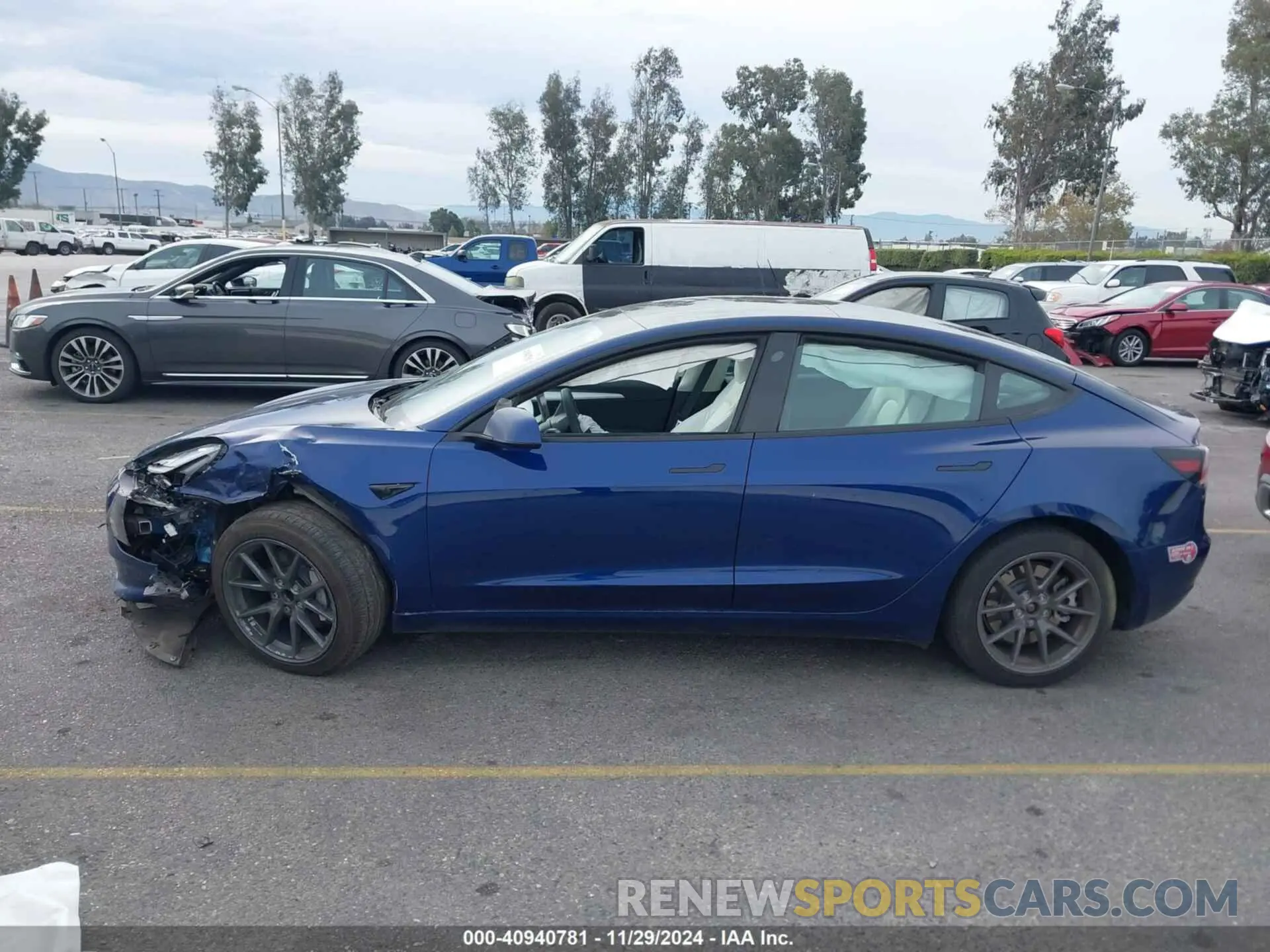 14 Photograph of a damaged car 5YJ3E1EA6PF610566 TESLA MODEL 3 2023