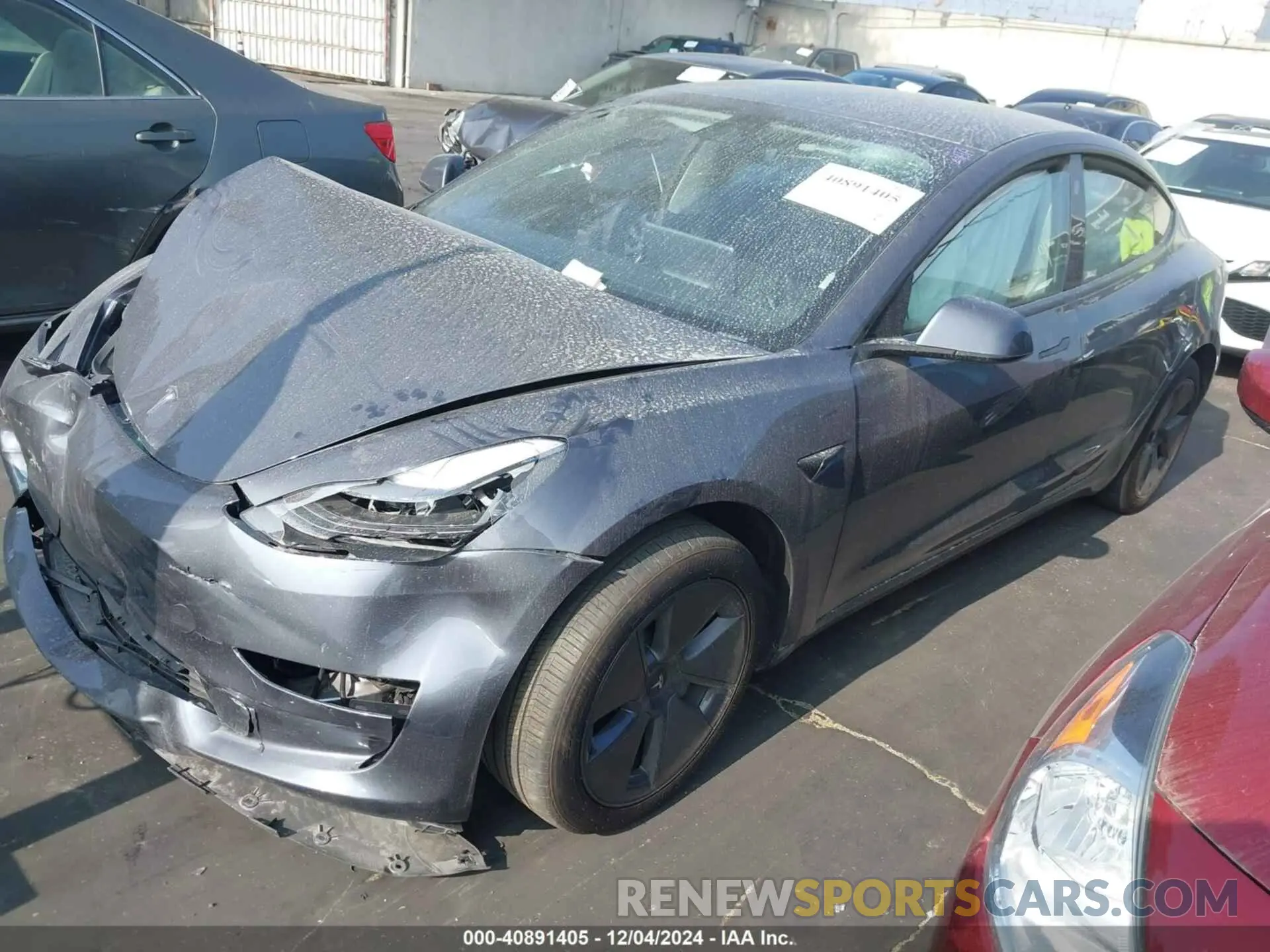 2 Photograph of a damaged car 5YJ3E1EA6PF704561 TESLA MODEL 3 2023