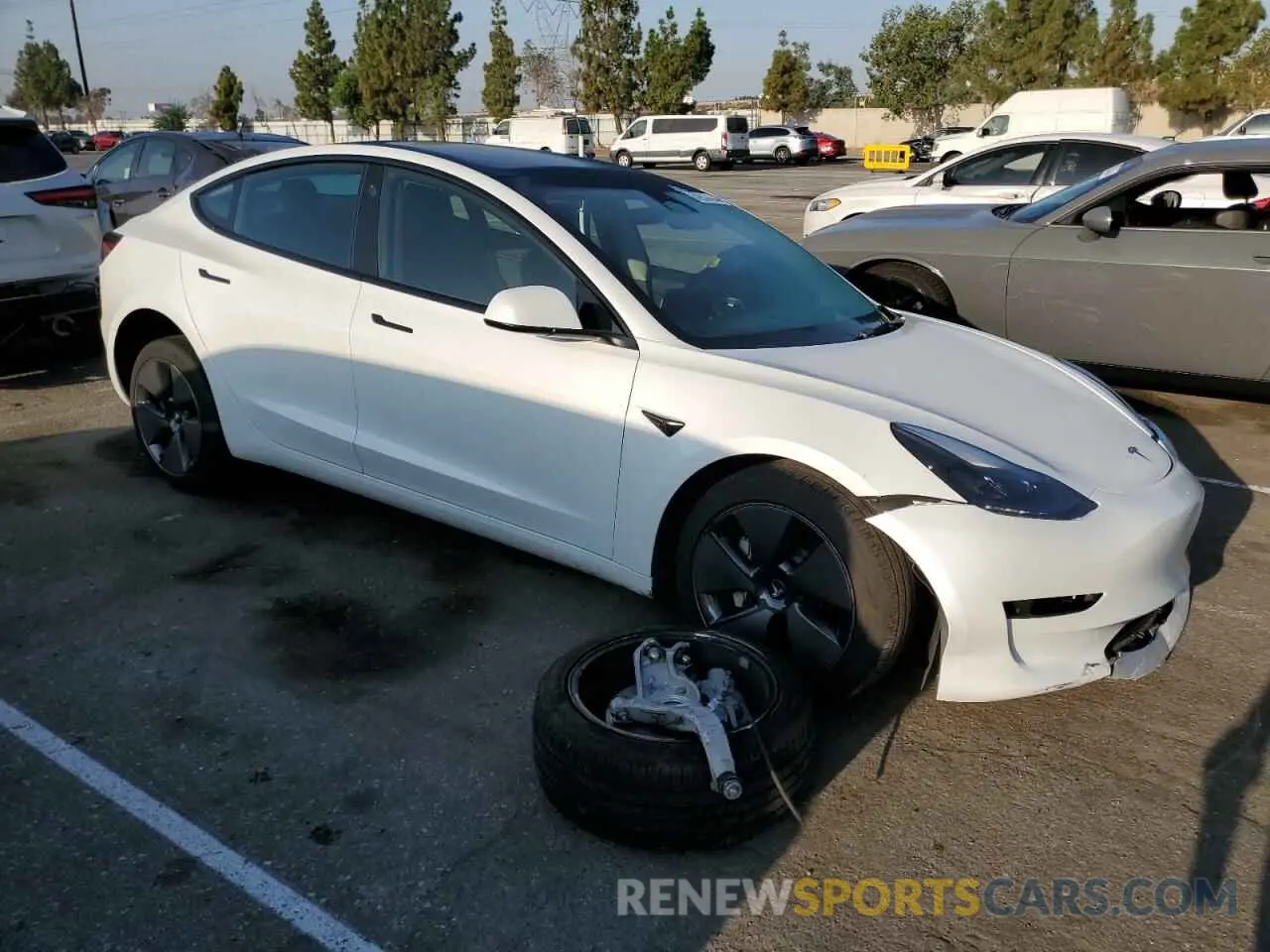 4 Photograph of a damaged car 5YJ3E1EA7PF417438 TESLA MODEL 3 2023