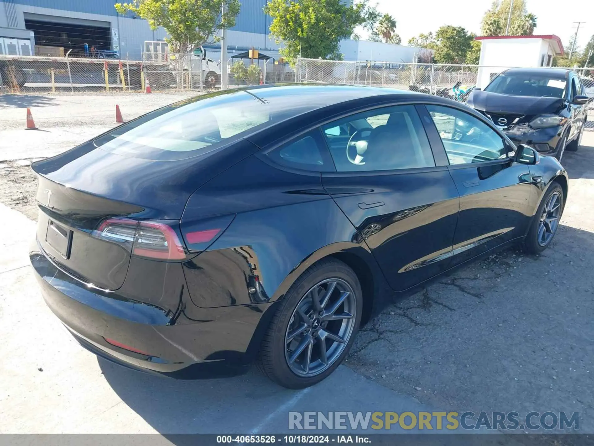 4 Photograph of a damaged car 5YJ3E1EA7PF457180 TESLA MODEL 3 2023