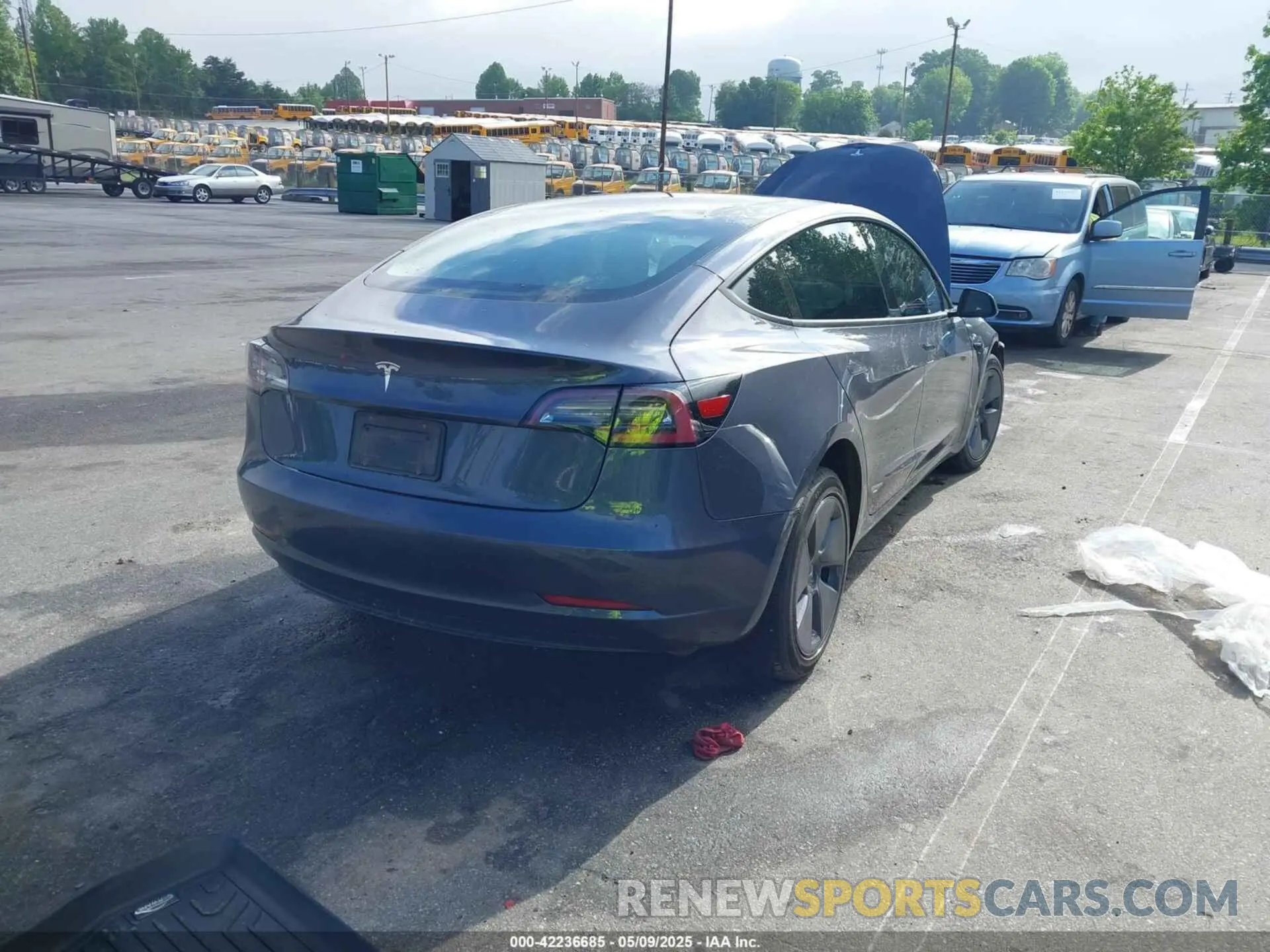 4 Photograph of a damaged car 5YJ3E1EA7PF457891 TESLA MODEL 3 2023