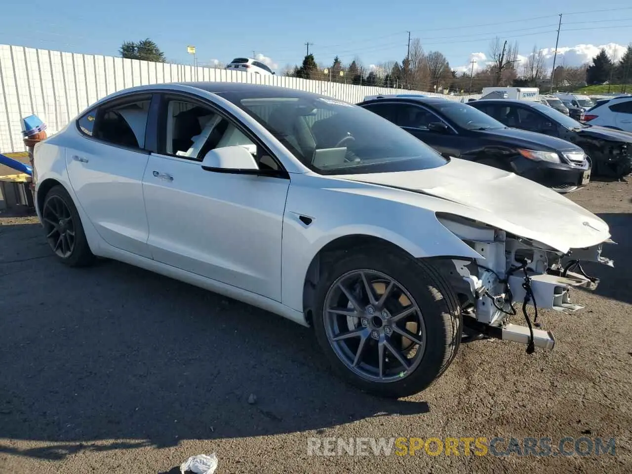4 Photograph of a damaged car 5YJ3E1EA7PF474240 TESLA MODEL 3 2023
