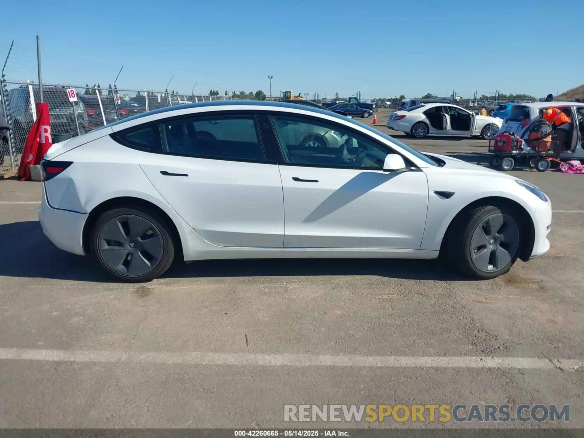 12 Photograph of a damaged car 5YJ3E1EA7PF486811 TESLA MODEL 3 2023