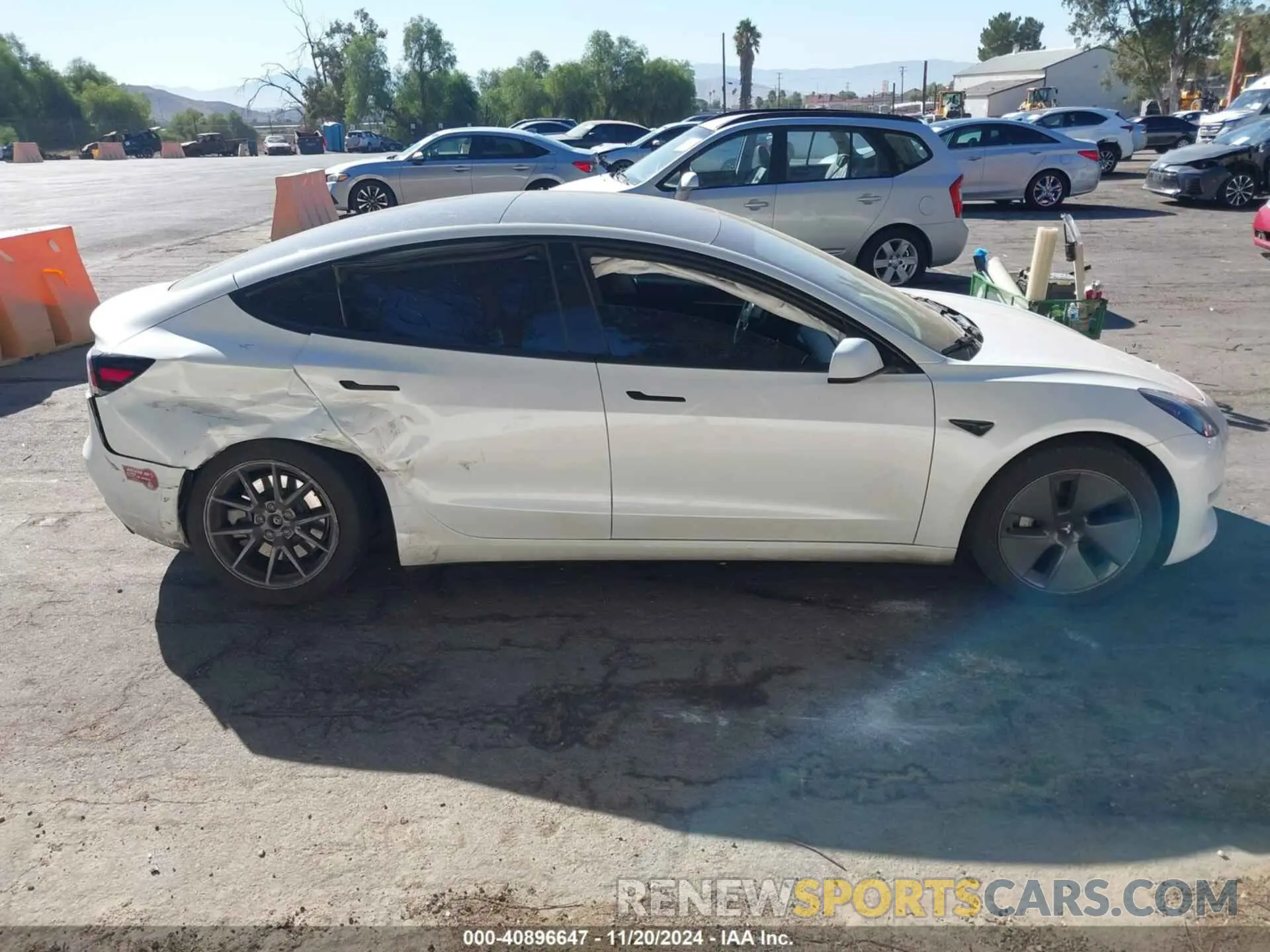 12 Photograph of a damaged car 5YJ3E1EA7PF574368 TESLA MODEL 3 2023