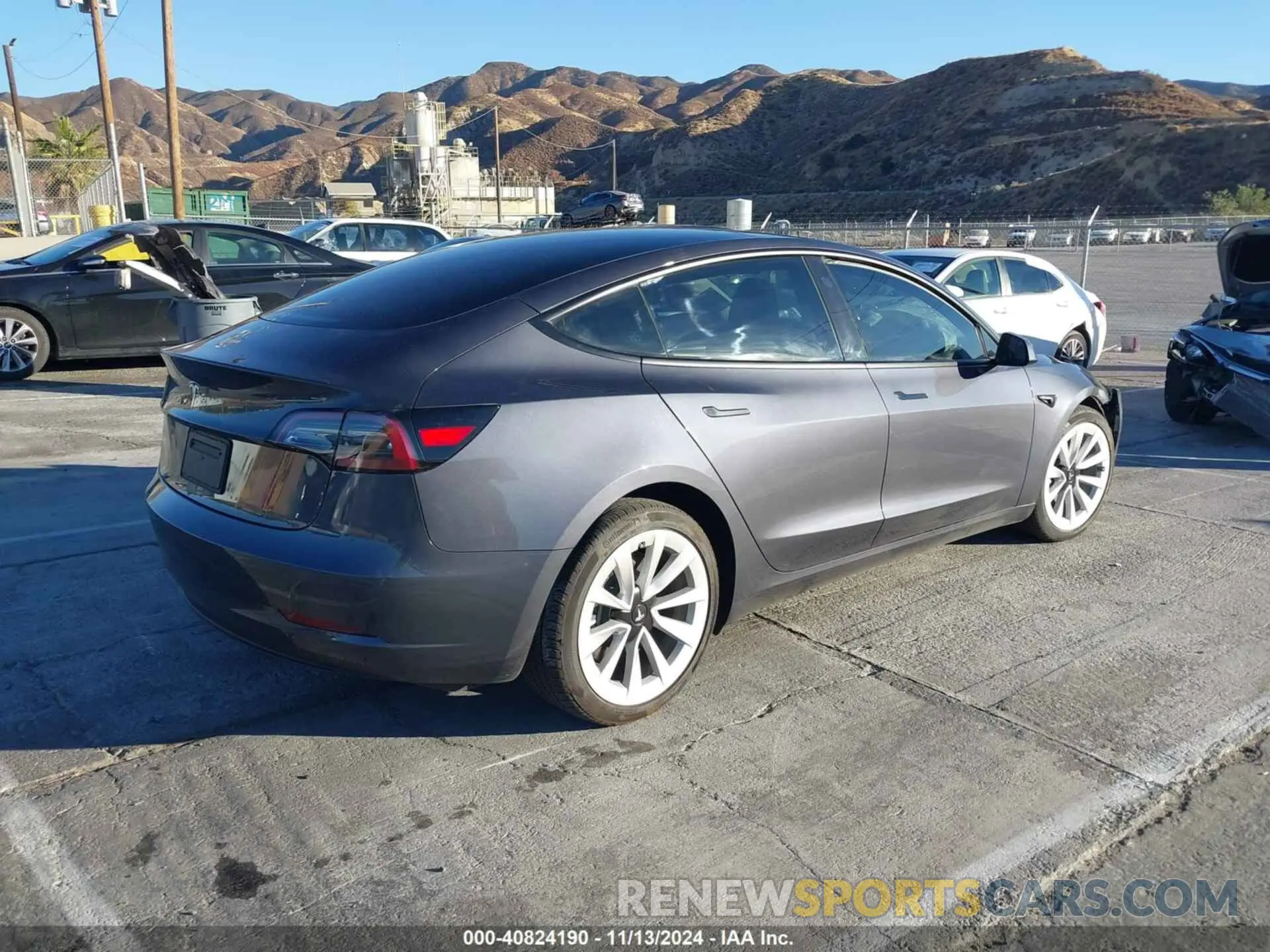 4 Photograph of a damaged car 5YJ3E1EA7PF671067 TESLA MODEL 3 2023