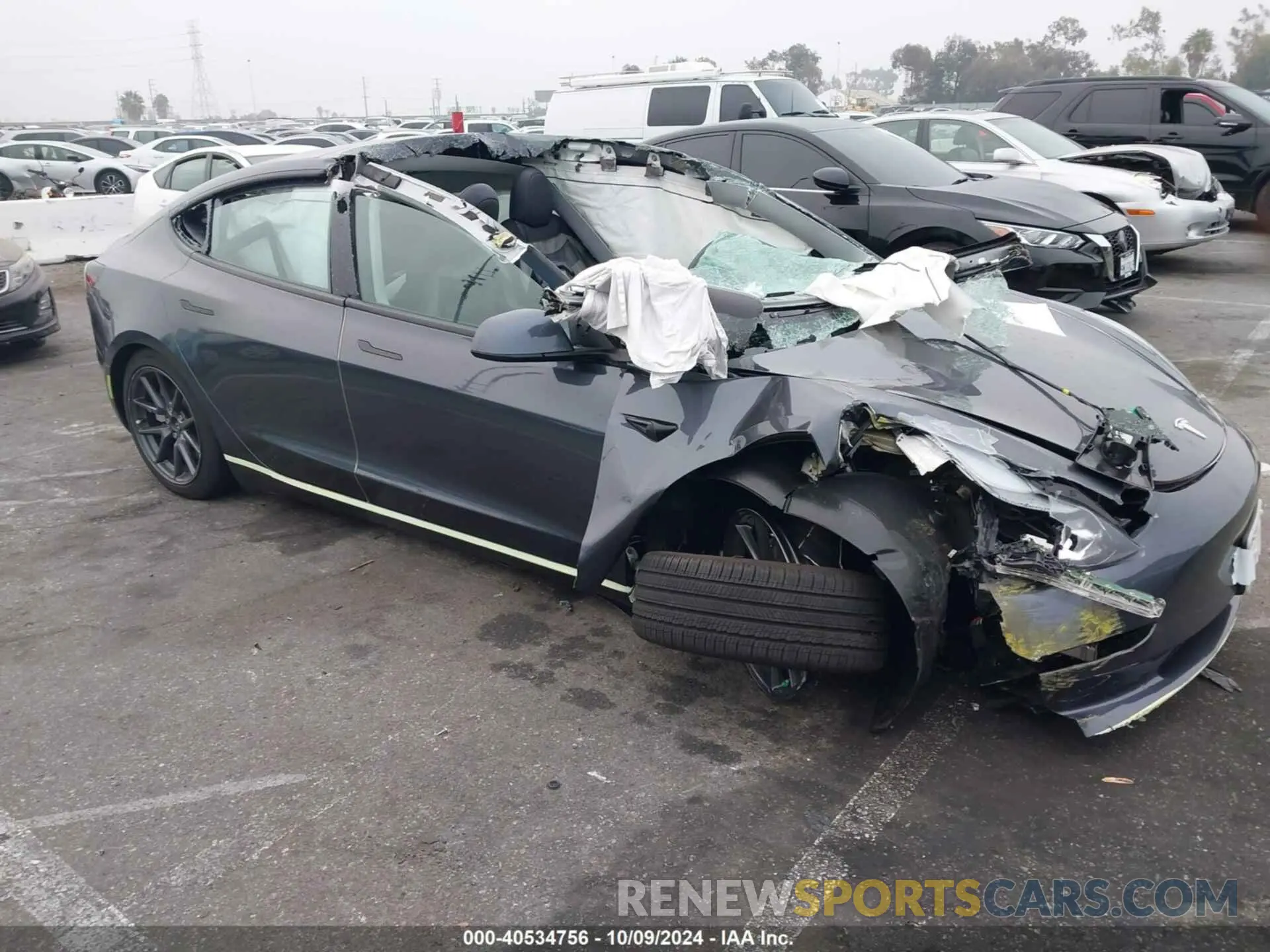 12 Photograph of a damaged car 5YJ3E1EA7PF676348 TESLA MODEL 3 2023