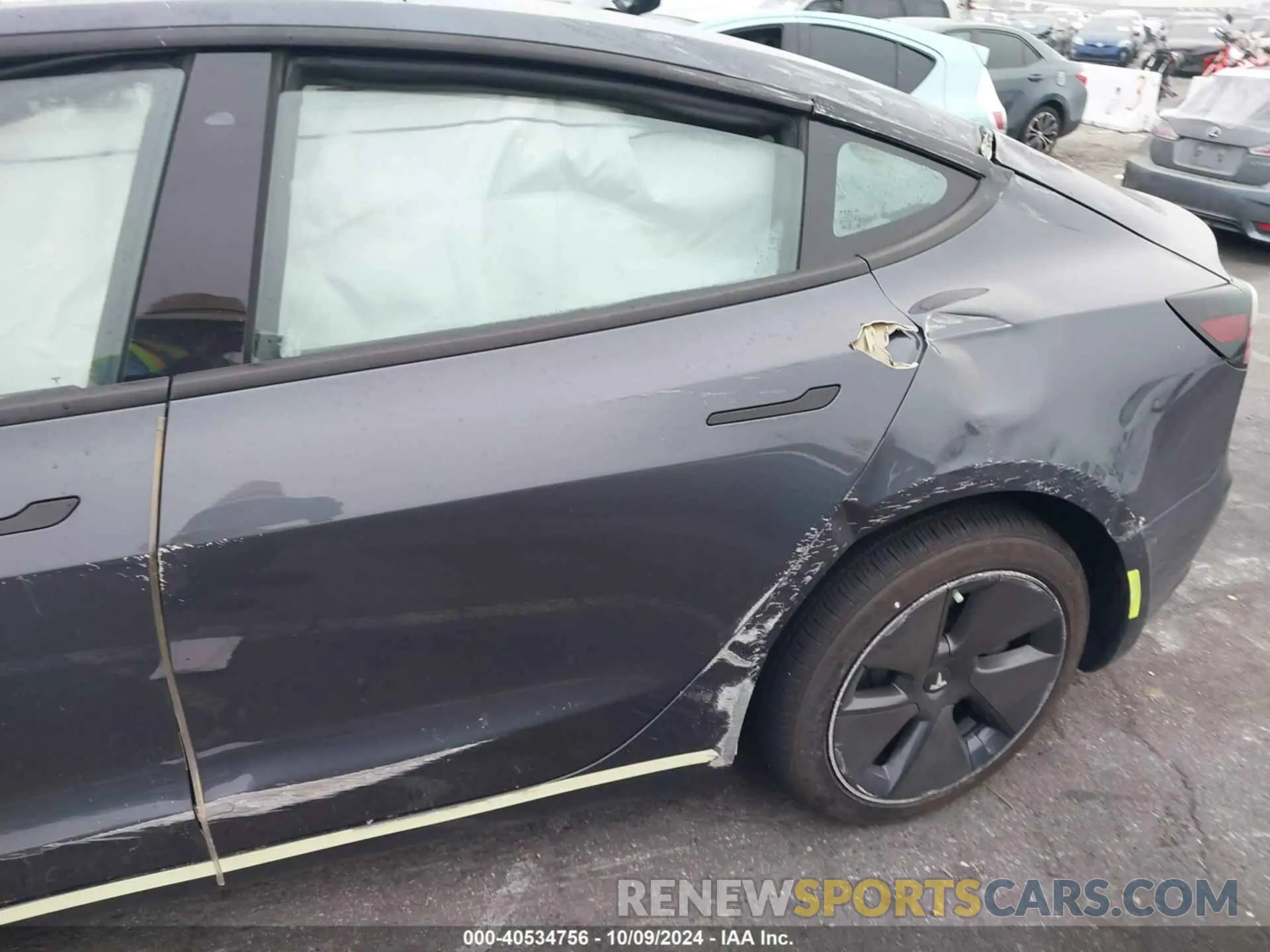 19 Photograph of a damaged car 5YJ3E1EA7PF676348 TESLA MODEL 3 2023