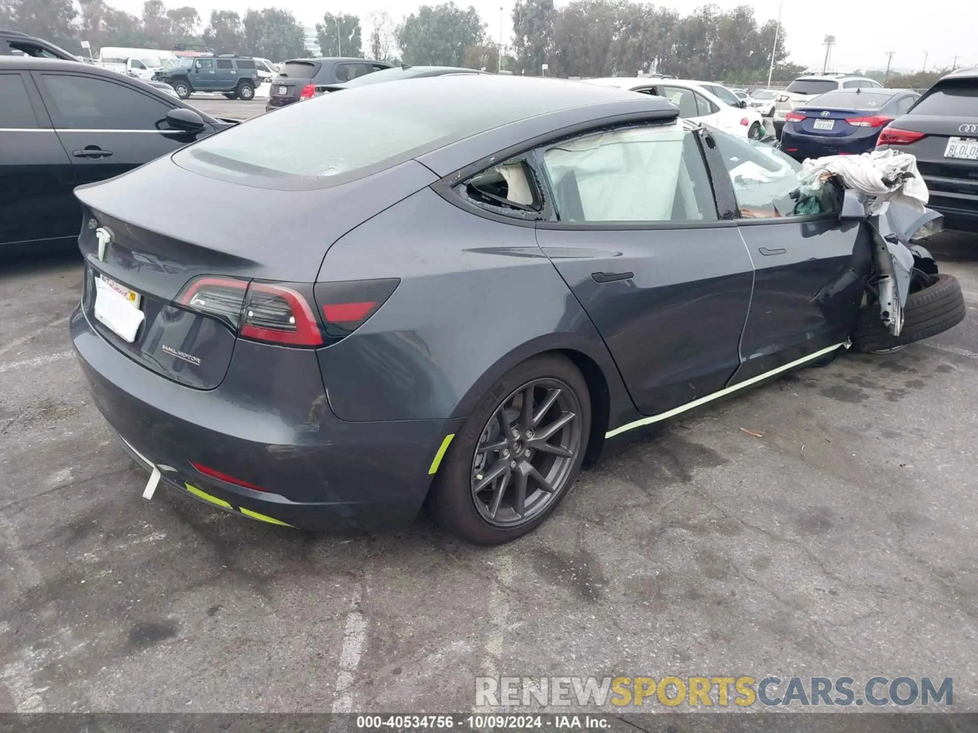 4 Photograph of a damaged car 5YJ3E1EA7PF676348 TESLA MODEL 3 2023